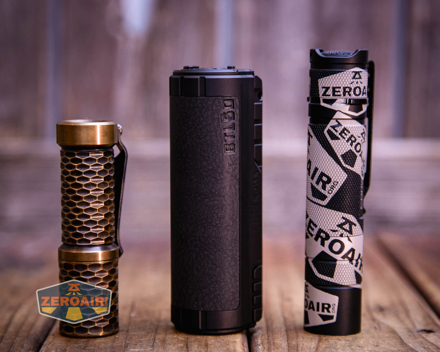 Imalent BTL50 black flashlight with two standard sized flashlights