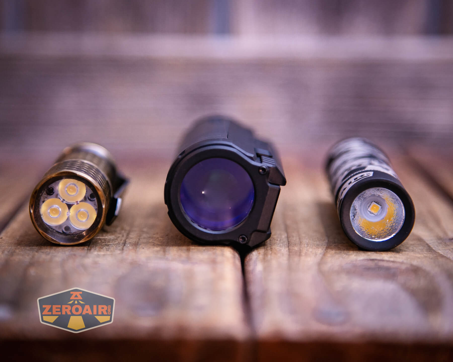 Imalent BTL50 black flashlight with two standard sized flashlights