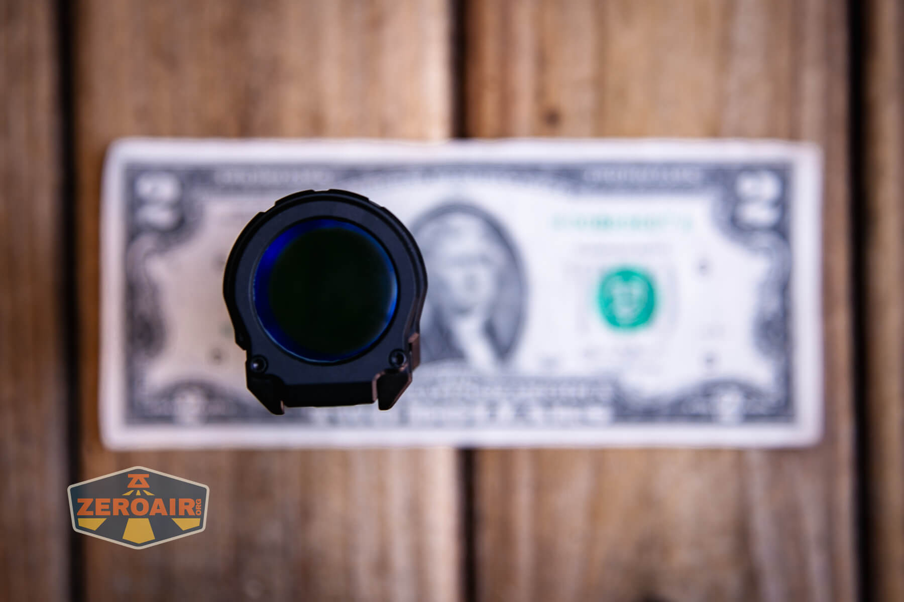 Imalent BTL50 Grey LEP flashlight on a two dollar bill