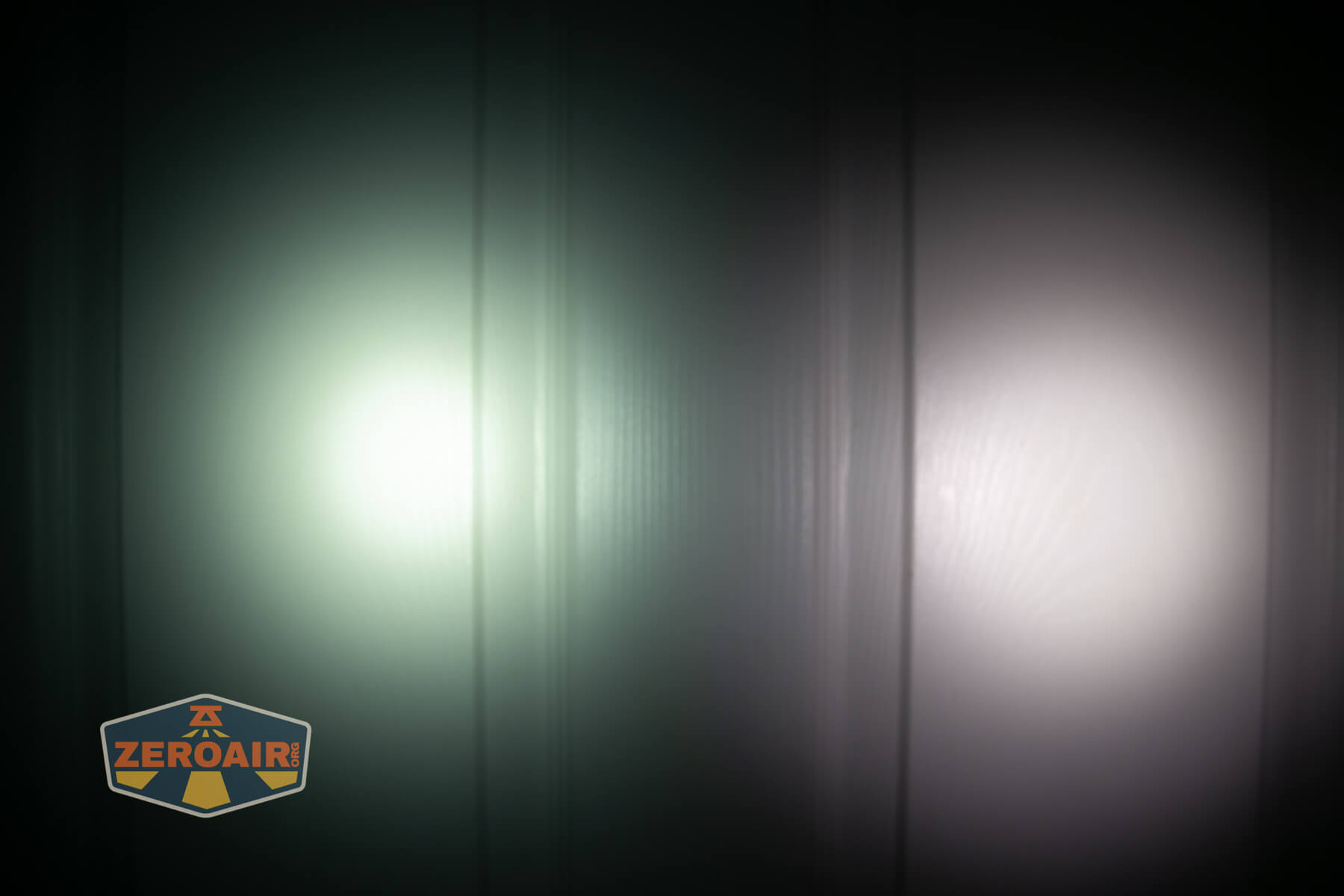 Imalent BTL50 Grey LEP flashlight beamshots on door (at 1') compared to nichia 219b 4500K