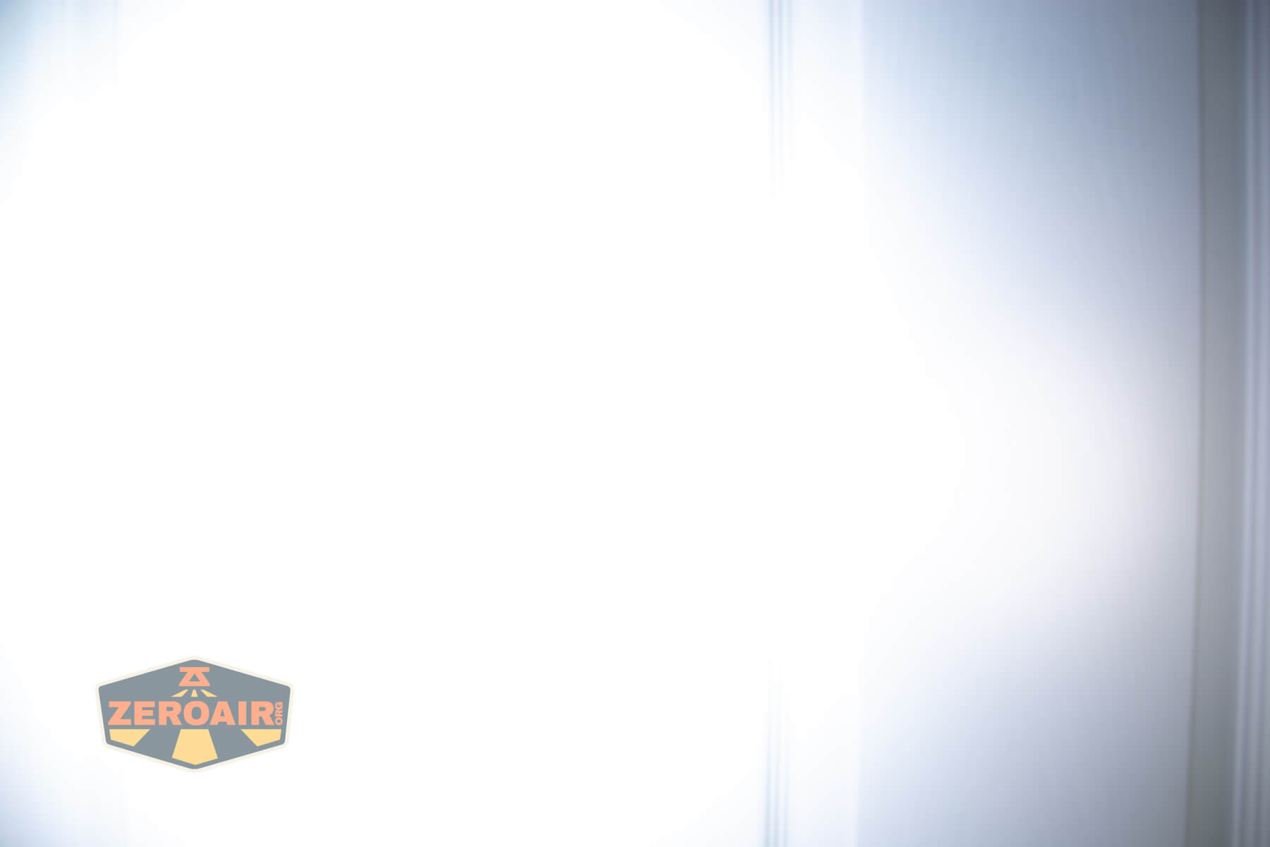 Imalent BTL50 Grey LEP flashlight beamshots on door (at 1') compared to nichia 219b 4500K