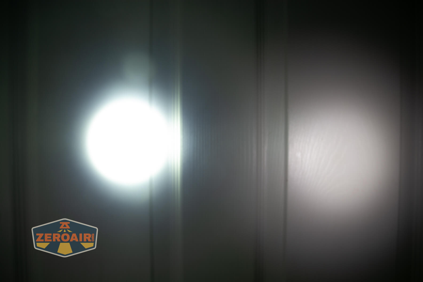 Imalent BTL50 Grey LEP flashlight beamshots on door (at 1') compared to nichia 219b 4500K