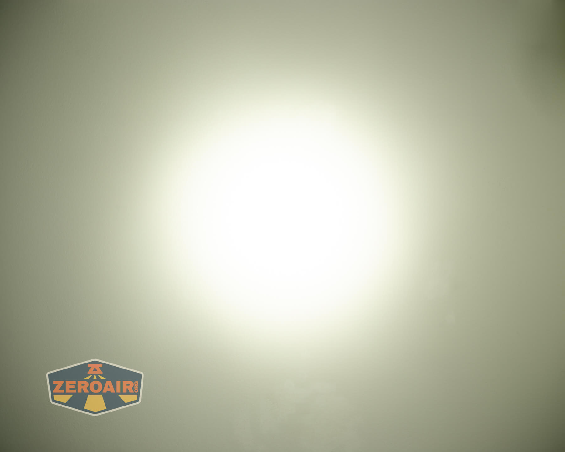 JETBeam E28 EDC Multi-mode Flat Tactical flashlight beamshots on ceiling