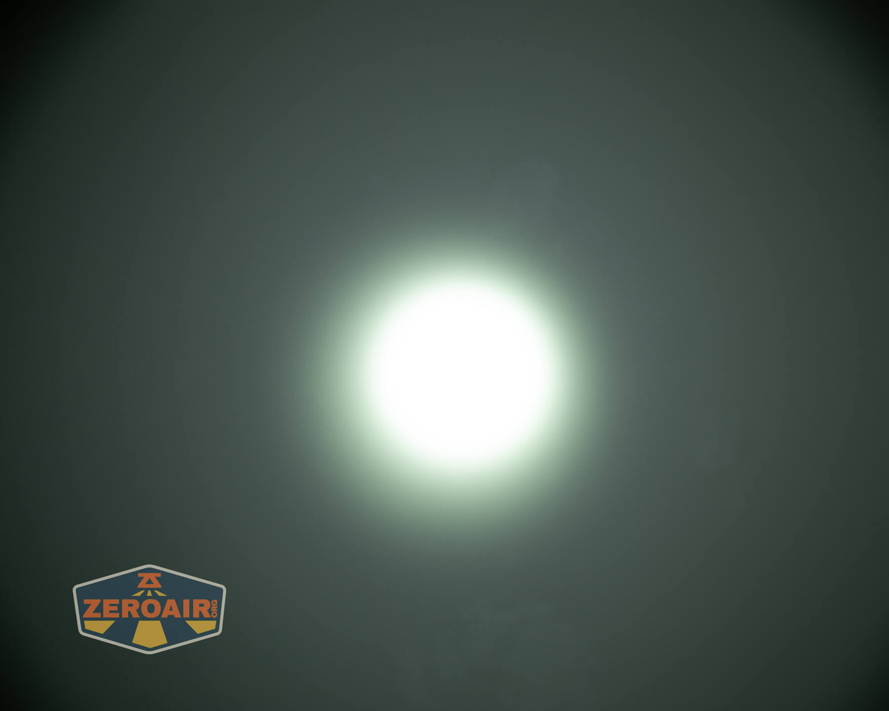 JETBeam E28 EDC Multi-mode Flat Tactical flashlight beamshots on ceiling