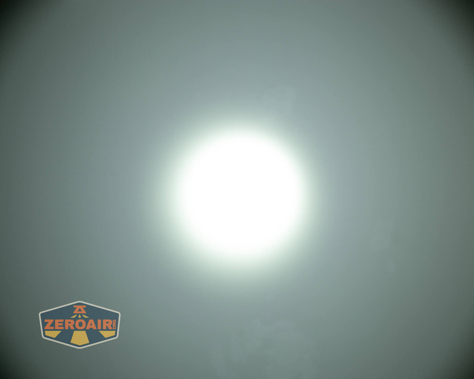 JETBeam E28 EDC Multi-mode Flat Tactical flashlight beamshots on ceiling