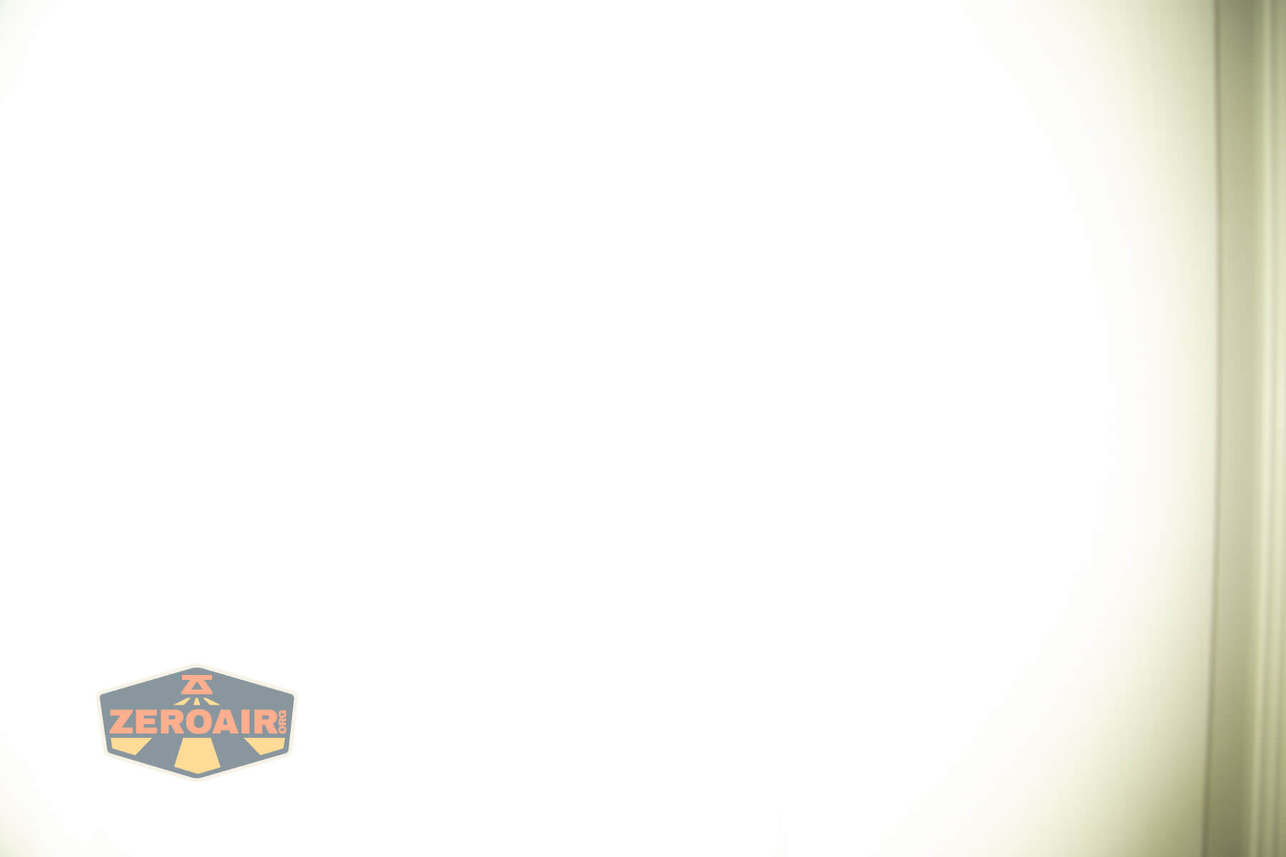 JETBeam E28 EDC Multi-mode Flat Tactical flashlight beamshots on door (at 1') compared to nichia 219b 4500K