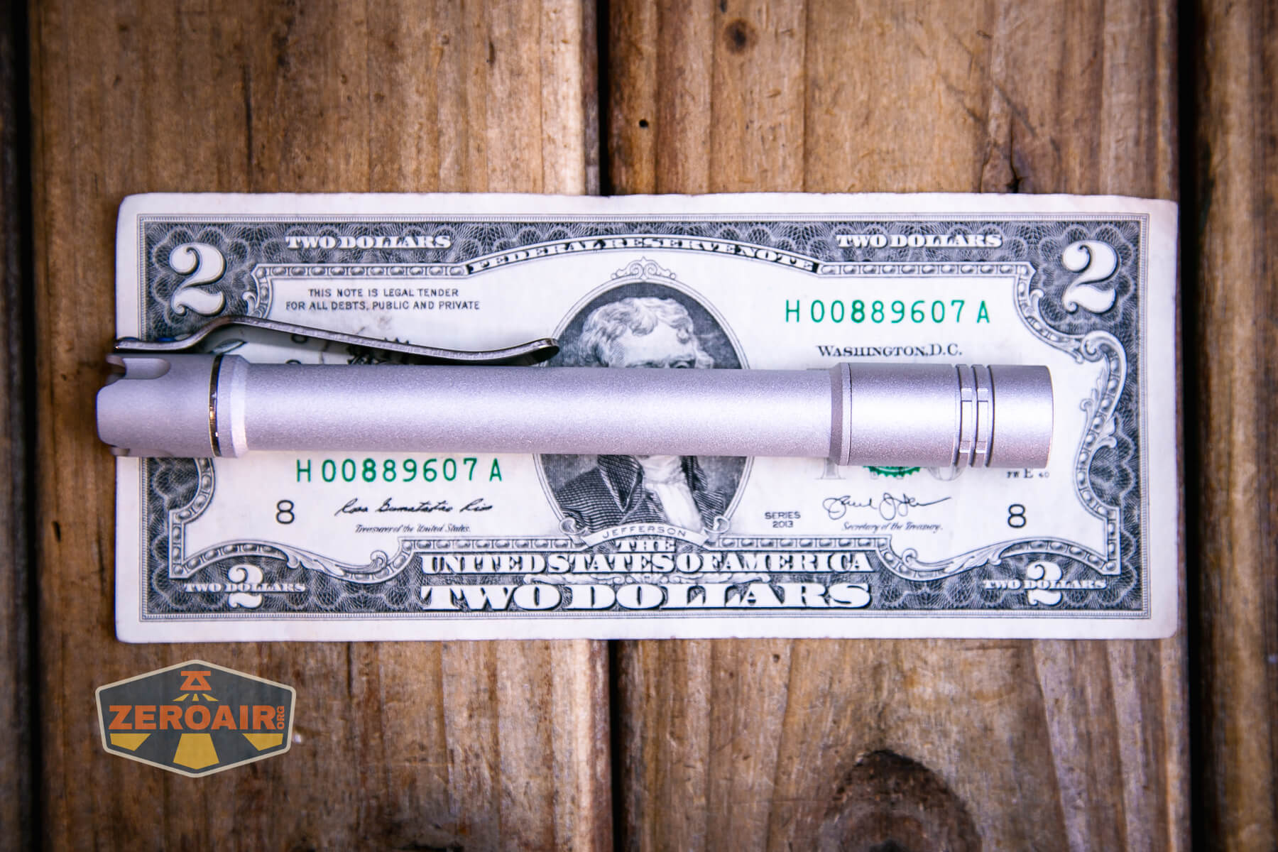 ReyLight Penlight MkII Aluminum on a two dollar bill
