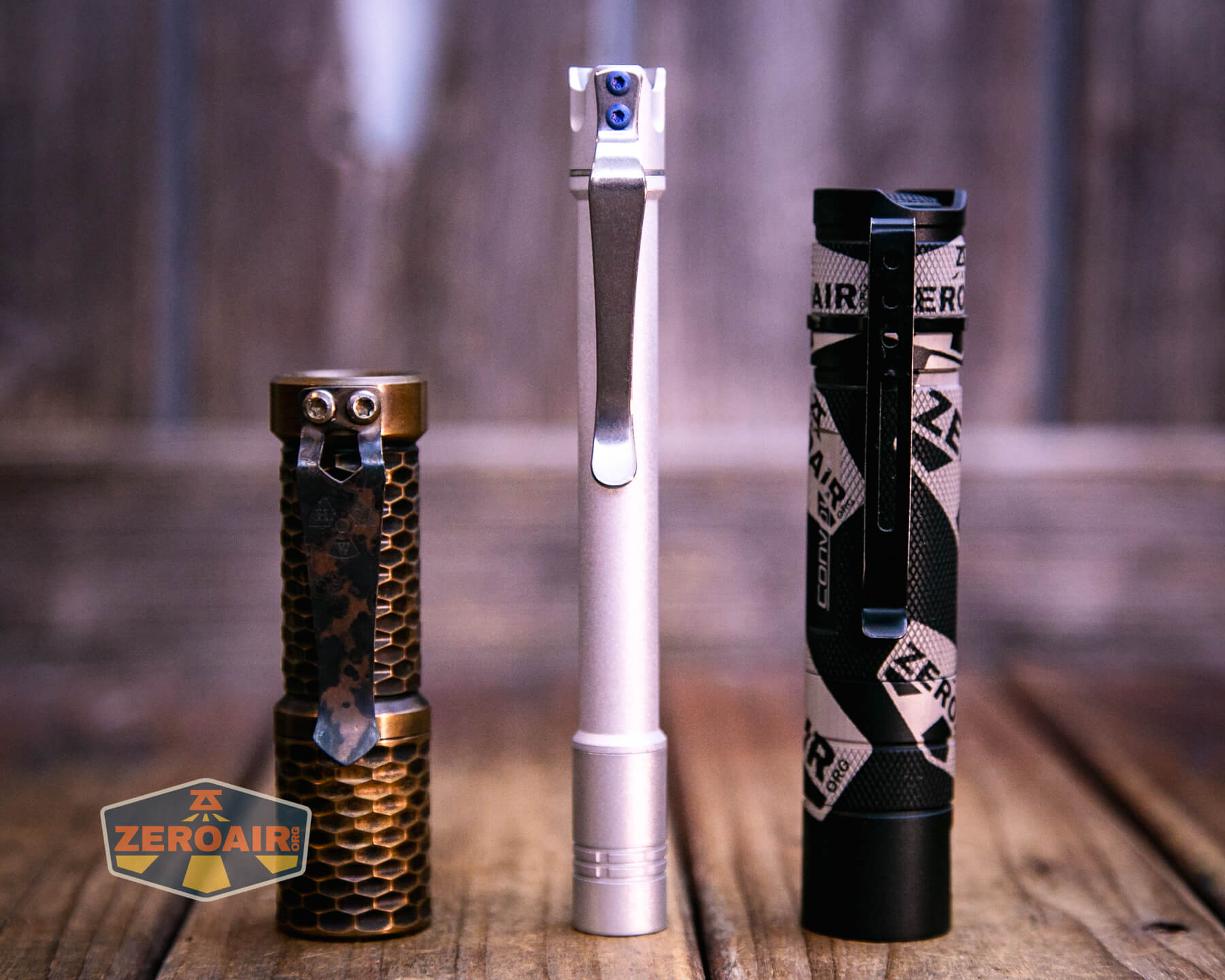 ReyLight Penlight MkII Aluminum with two standard sized flashlights