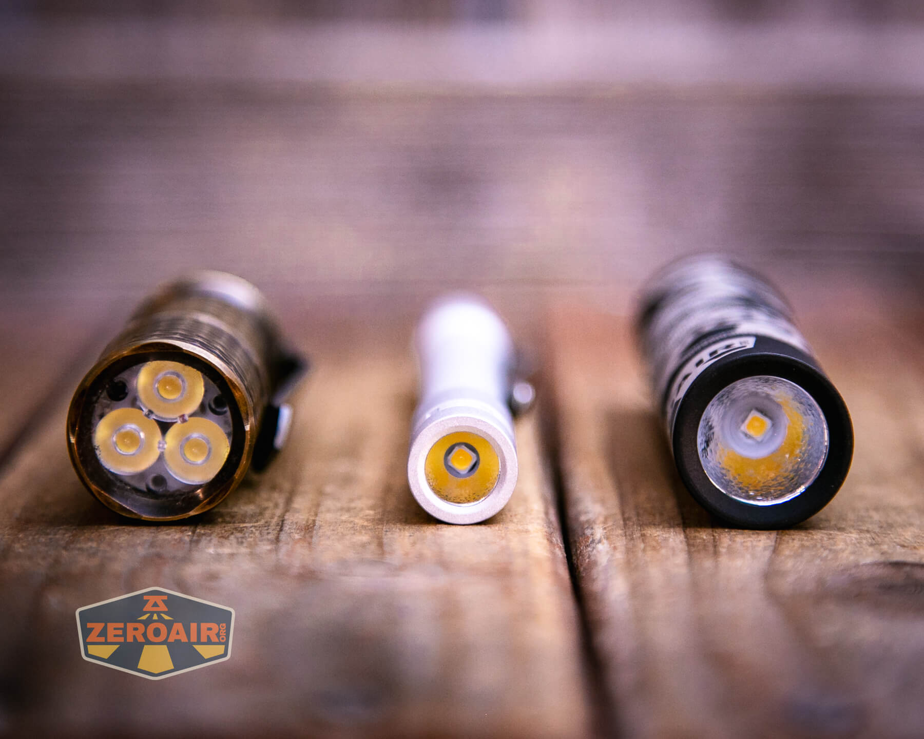 ReyLight Penlight MkII Aluminum with two standard sized flashlights