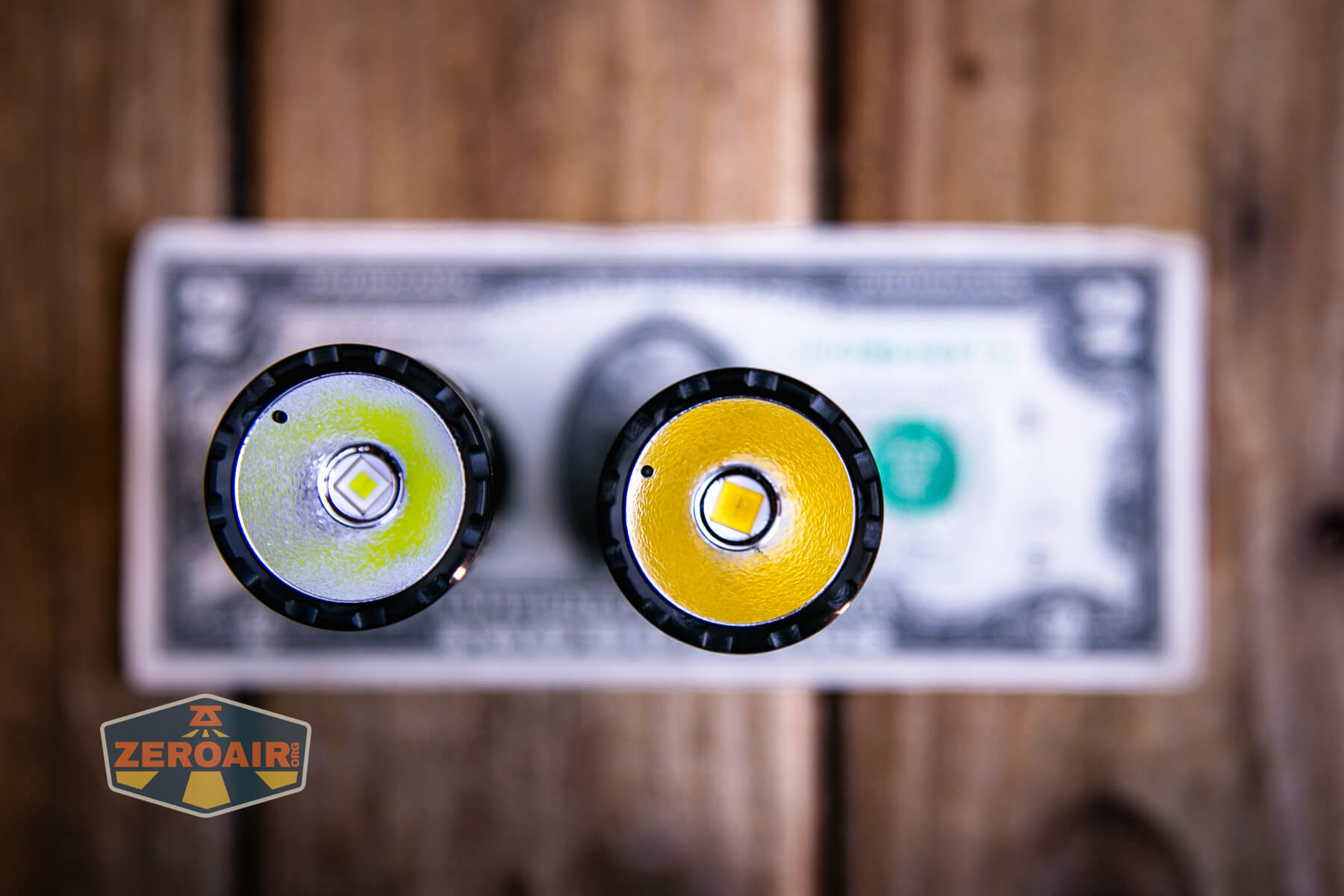 Skilhunt M300 V4 blue flashlight on a two dollar bill