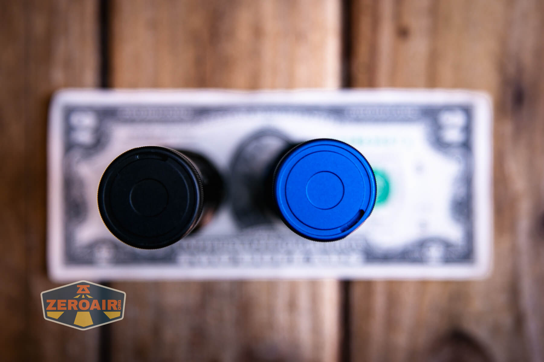 Skilhunt M300 V4 blue flashlight on a two dollar bill