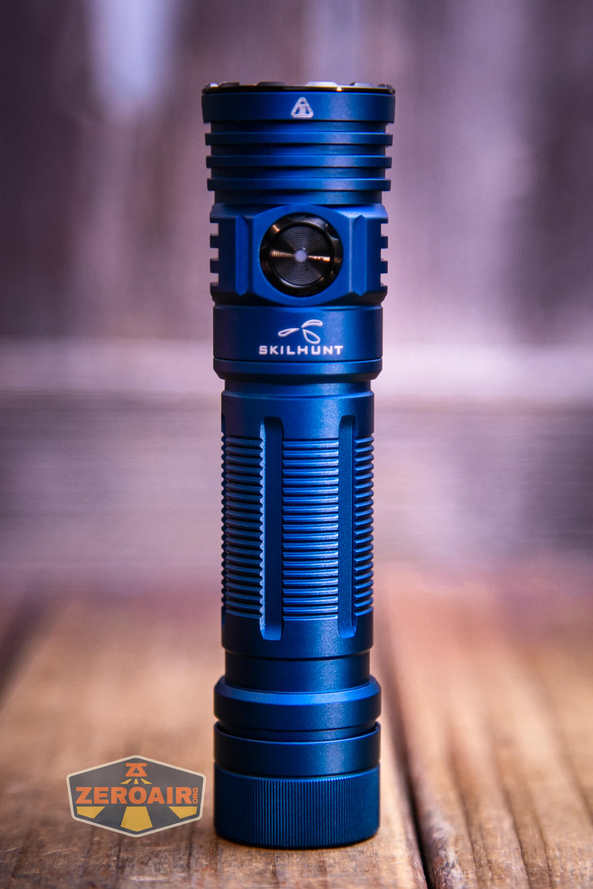 Skilhunt M300 V4 blue flashlight showing all sides