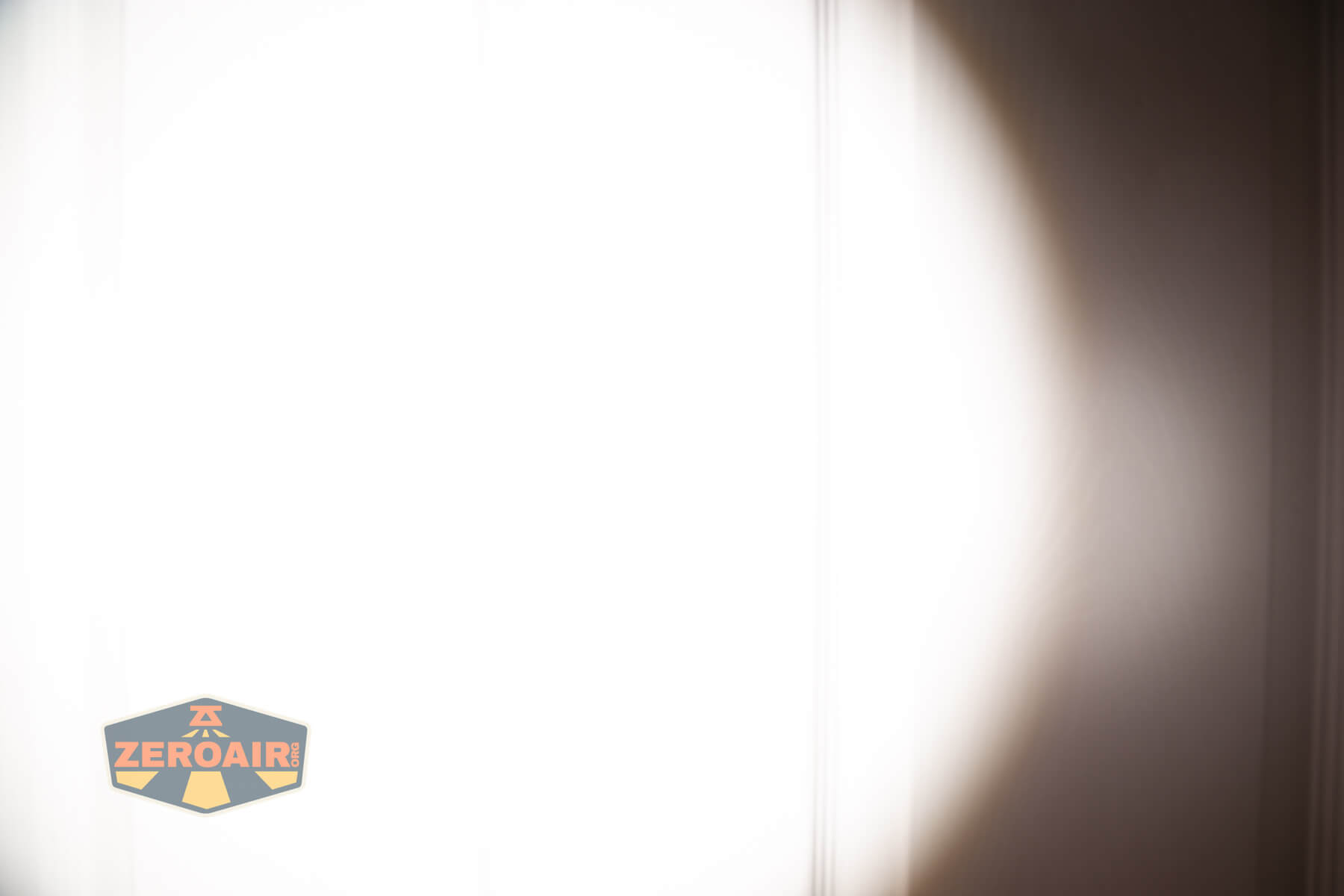 Skilhunt M300 V4 blue flashlight beamshots on door (at 1') compared to nichia 219b 4500K