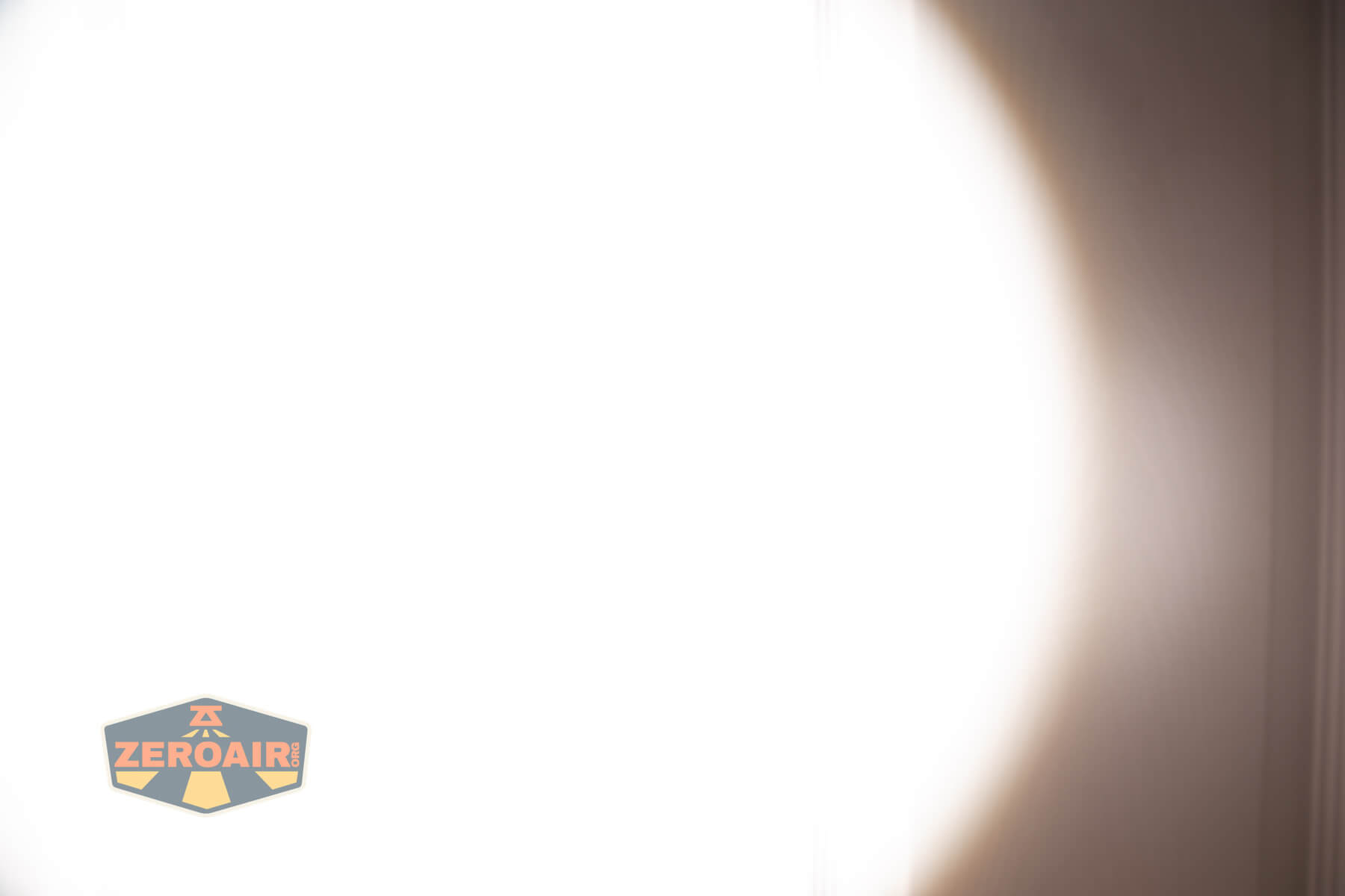 Skilhunt M300 V4 blue flashlight beamshots on door (at 1') compared to nichia 219b 4500K