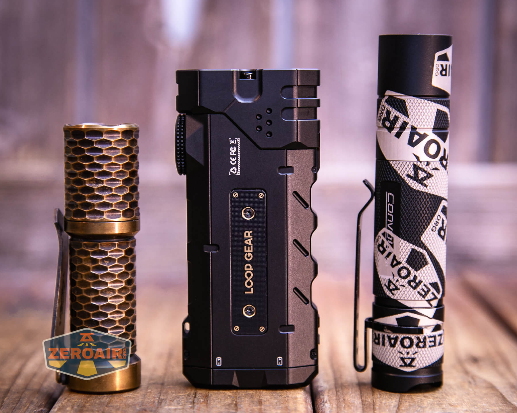 LoopGear SK-05 II Pro flashlight with two standard sized flashlights