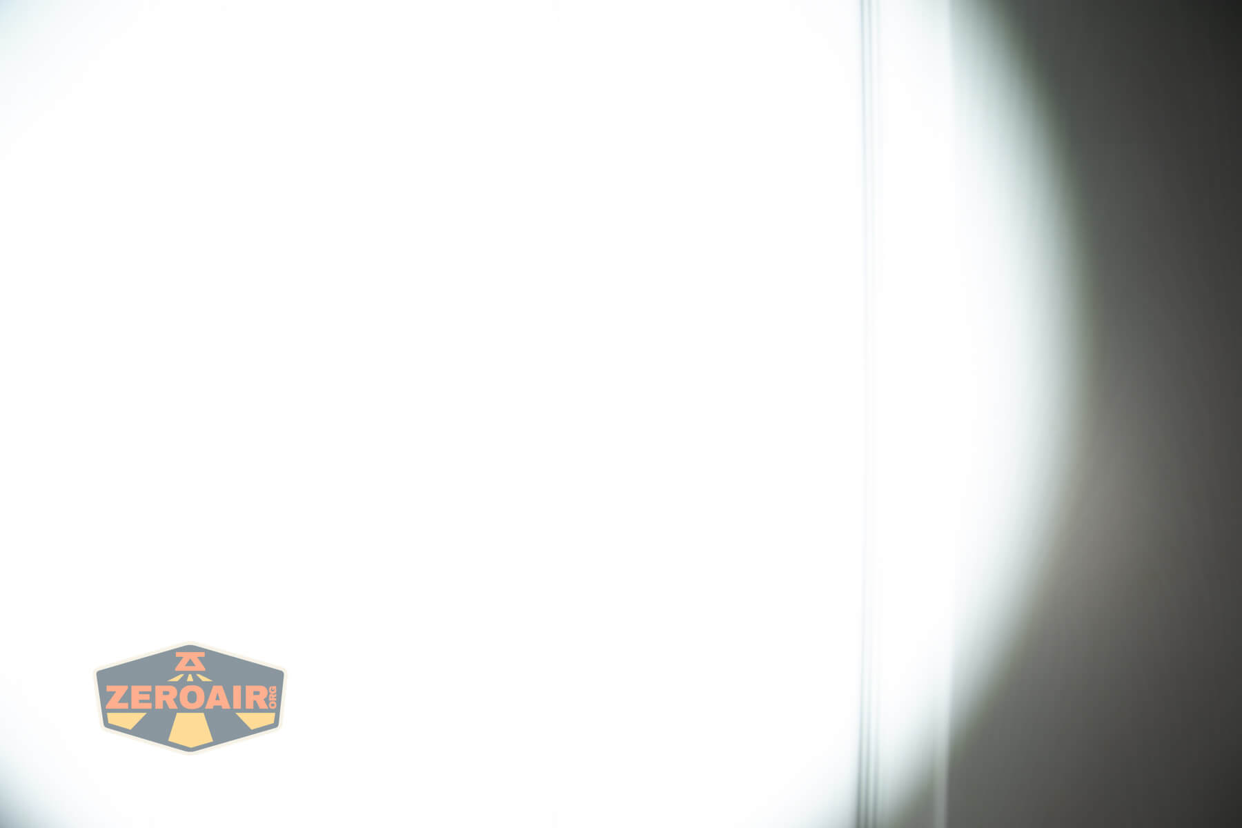 LoopGear SK-05 II Pro flashlight beamshots on door (at 1') compared to nichia 219b 4500K