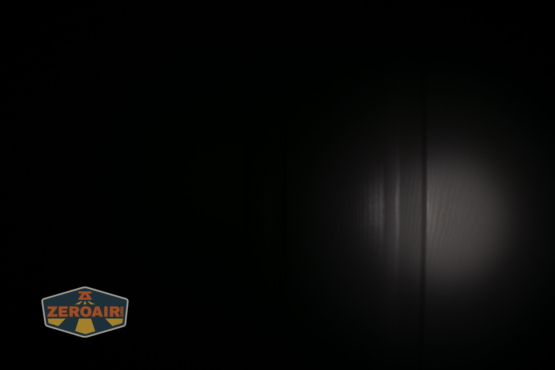 LoopGear SK-05 II Pro flashlight beamshots on door (at 1') compared to nichia 219b 4500K