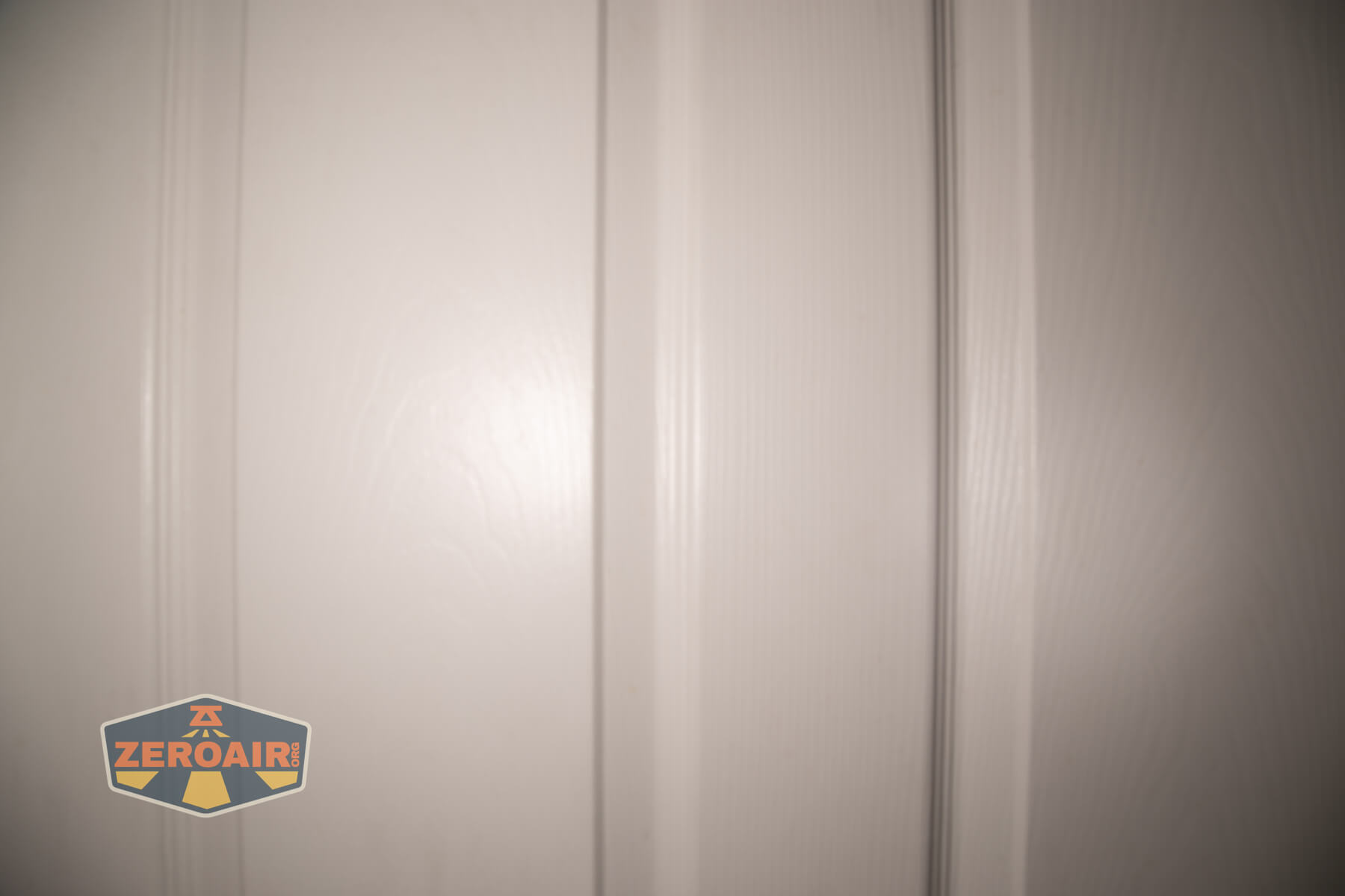 LoopGear SK-05 II Pro flashlight beamshots on door (at 1') compared to nichia 219b 4500K