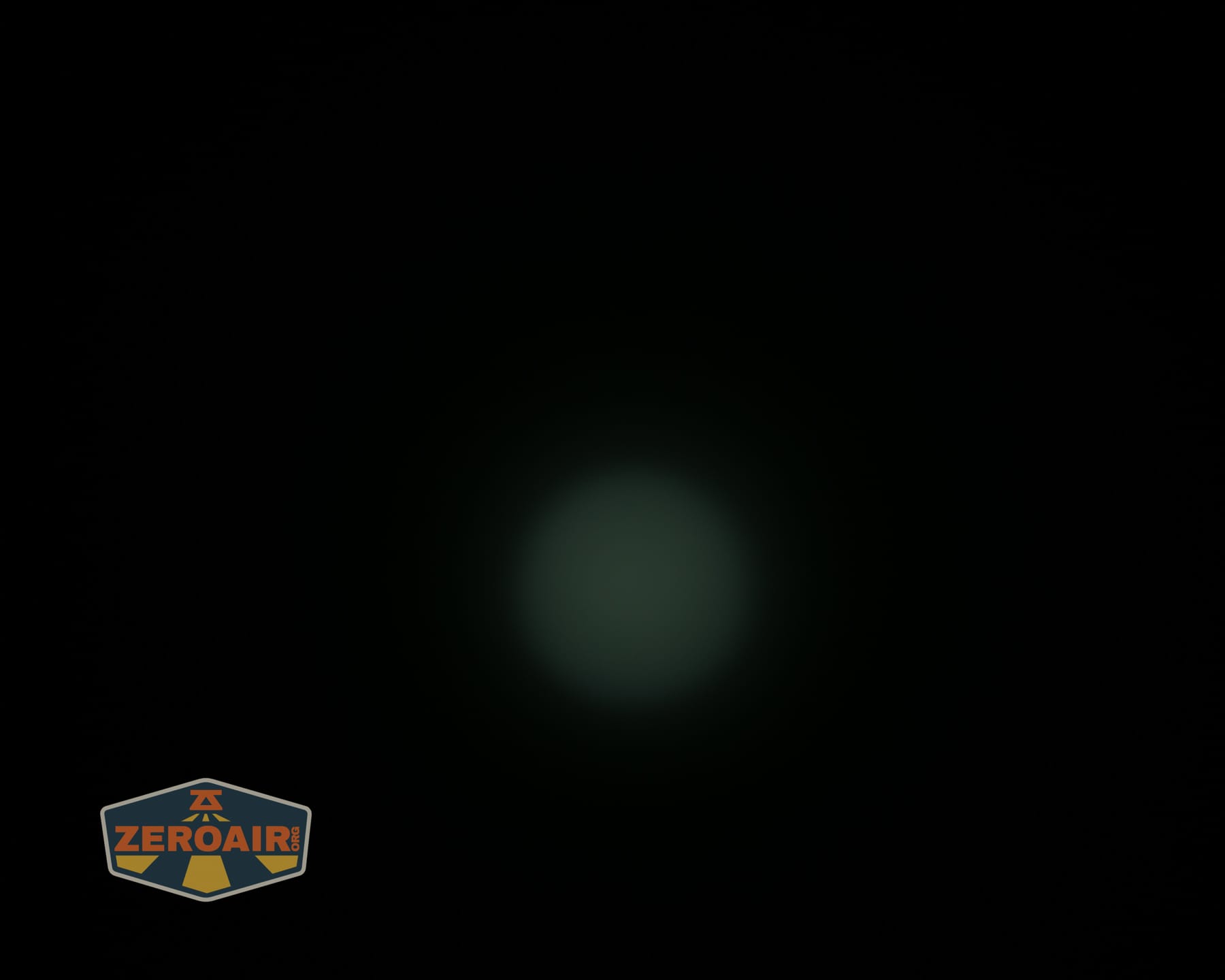 Olight ArkPro Ultra Onyx Black flashlight beamshots on ceiling