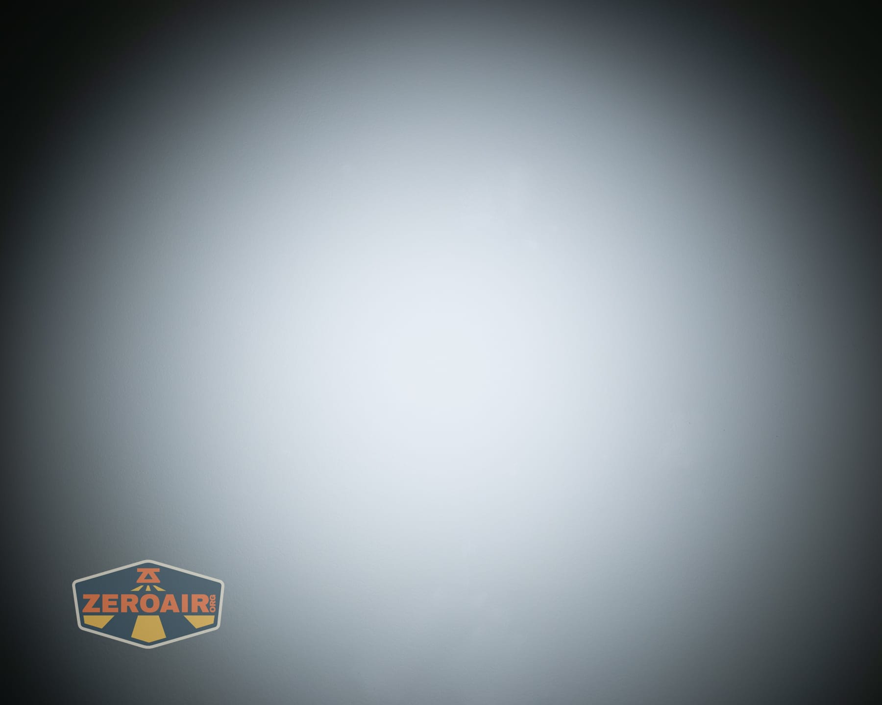 Olight ArkPro Ultra Onyx Black flashlight beamshots on ceiling