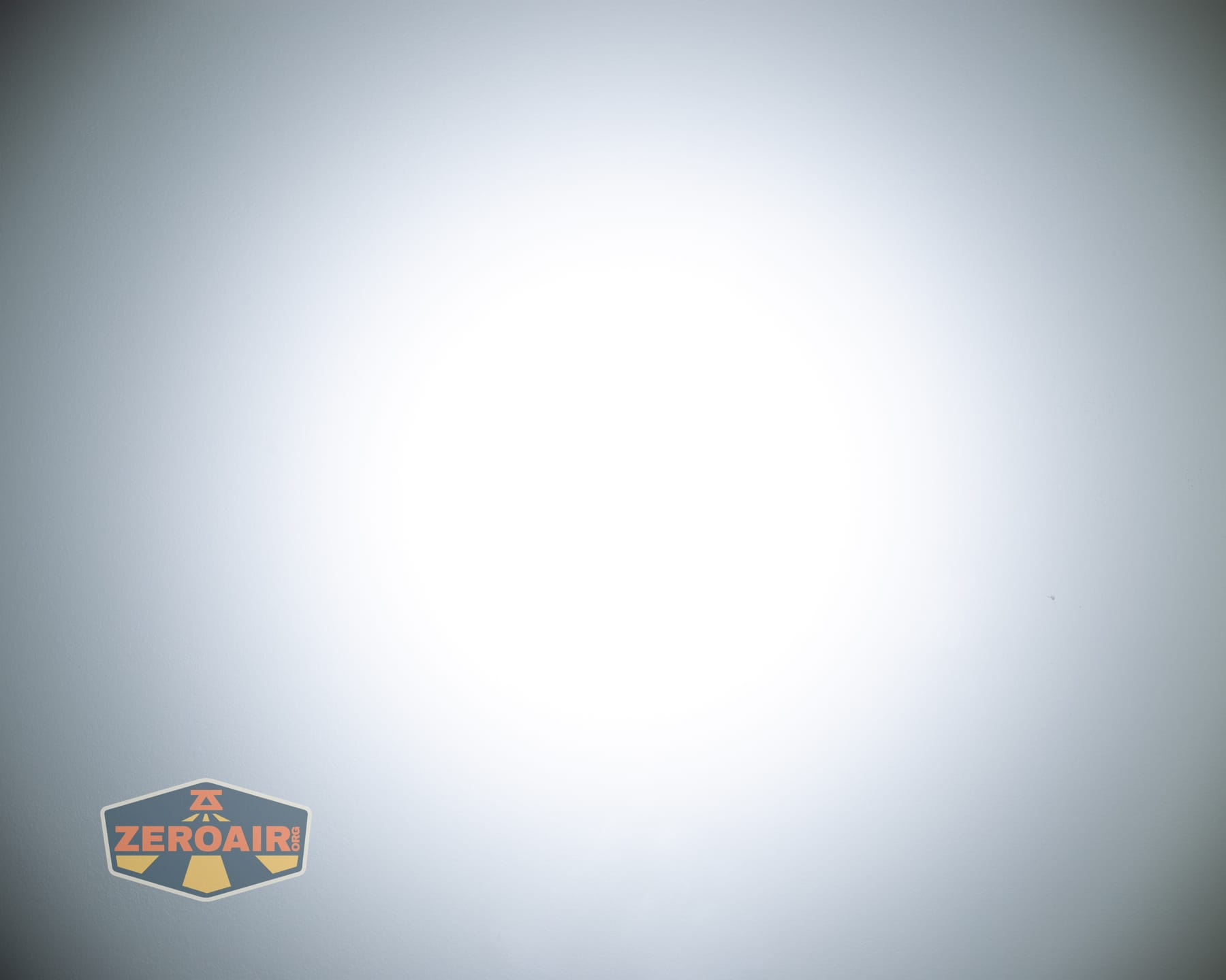 Olight ArkPro Ultra Onyx Black flashlight beamshots on ceiling