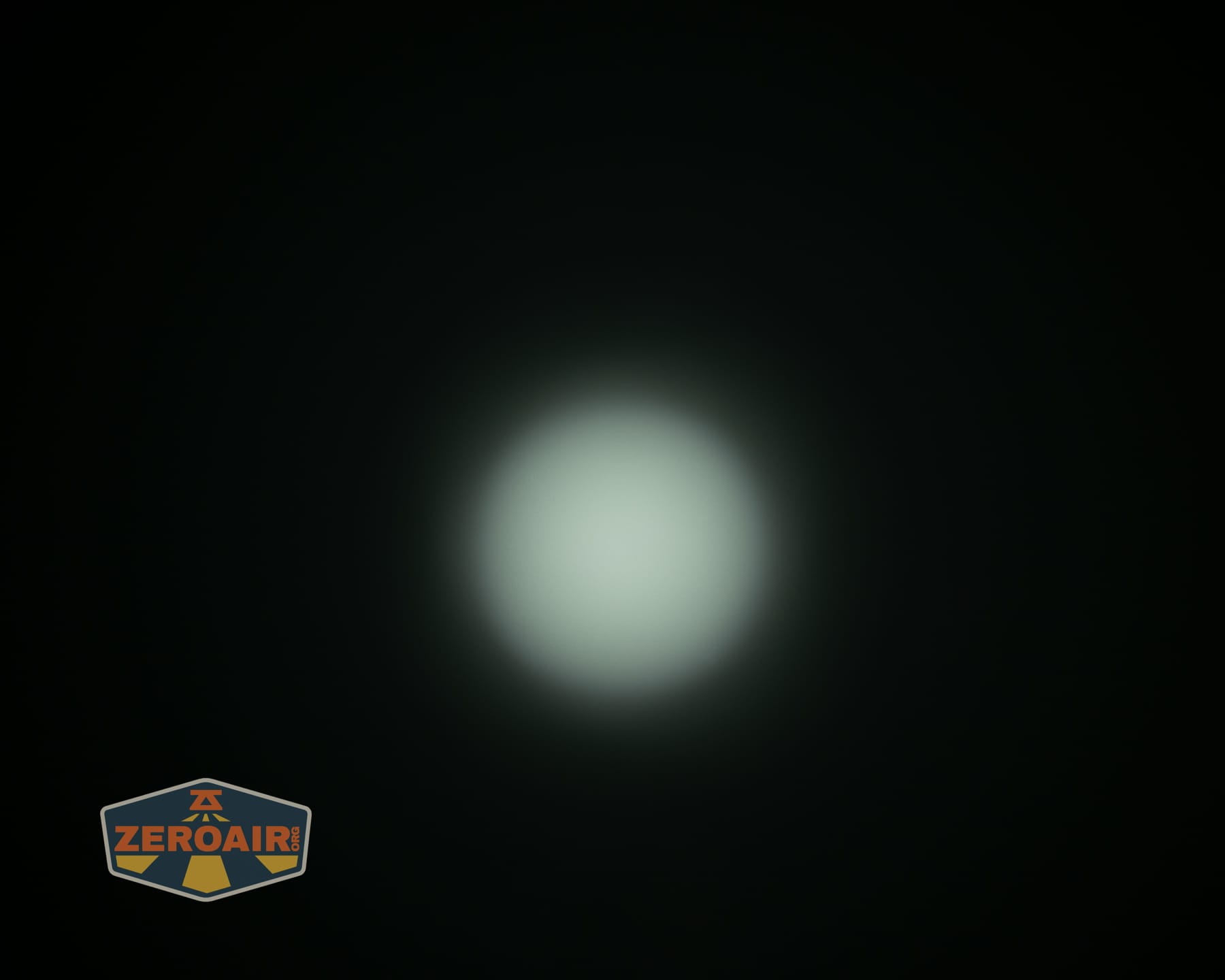 Olight Baton Ultra OAL flashlight beamshots on ceiling