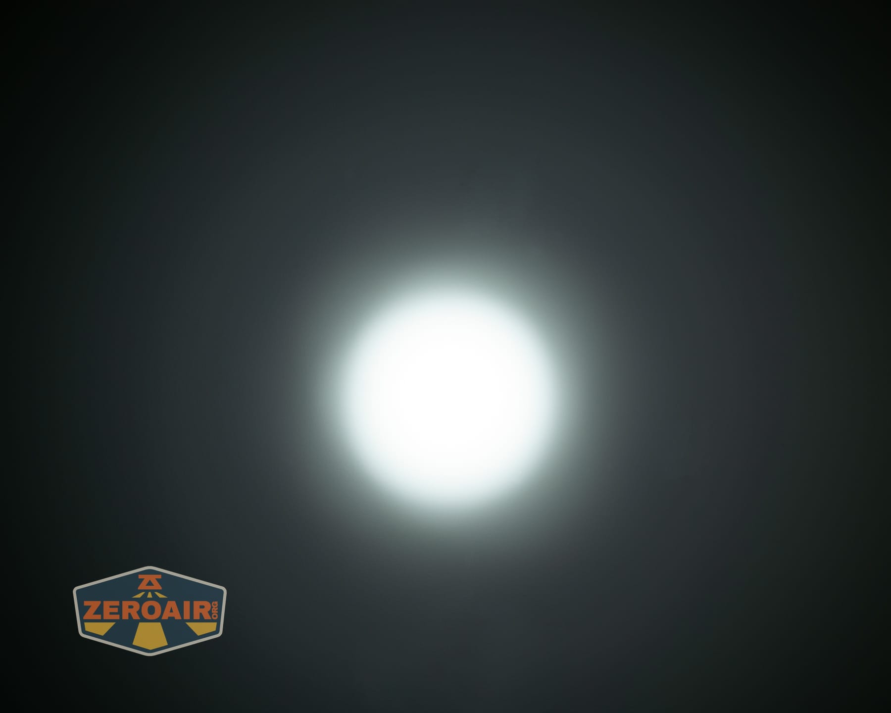 Olight Baton Ultra OAL flashlight beamshots on ceiling