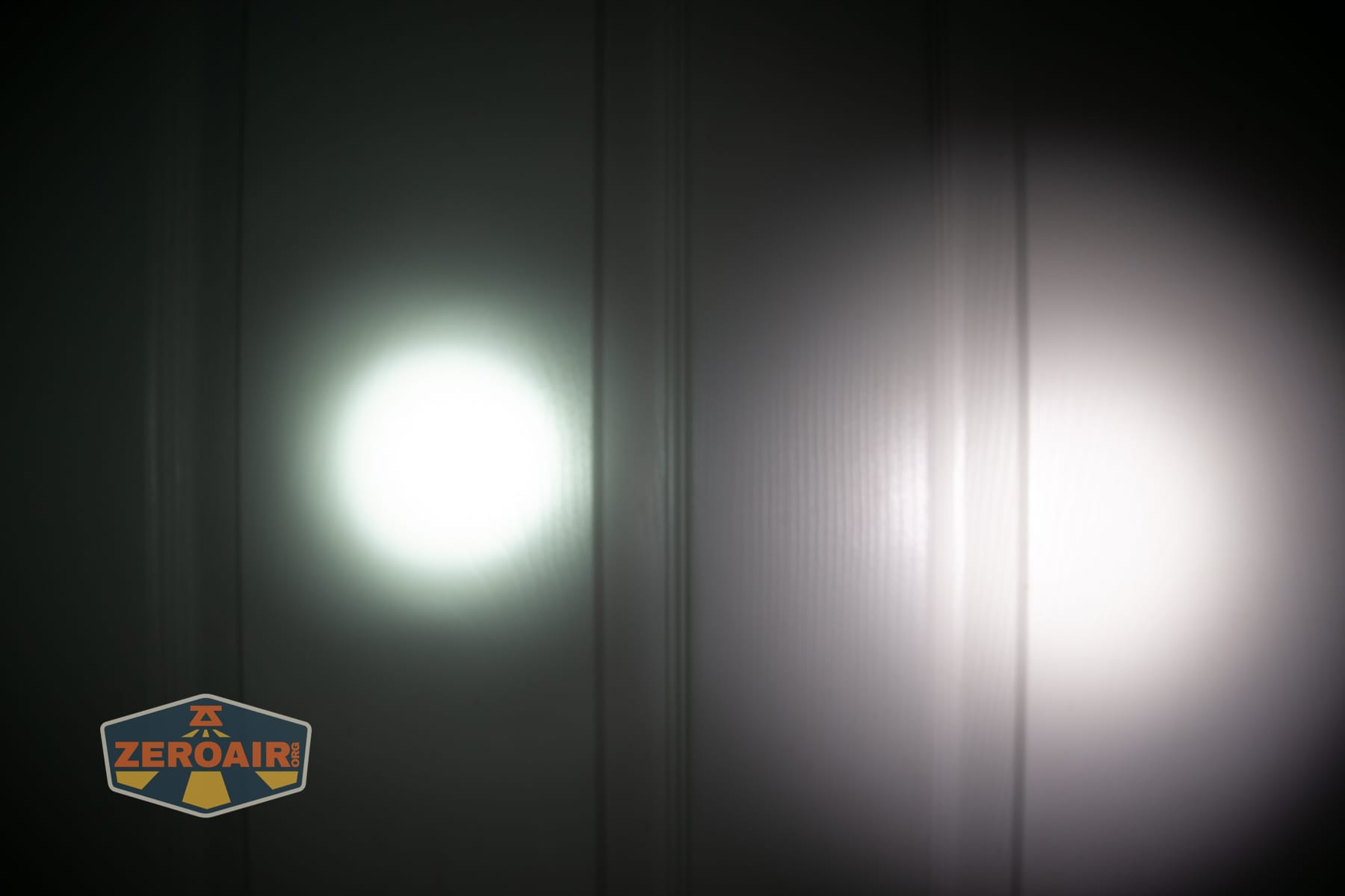 Olight Baton Ultra OAL flashlight beamshots on door (at 1') compared to nichia 219b 4500K