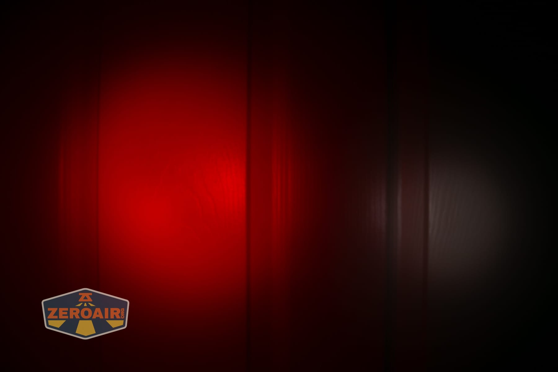 Trustfire Mini C Multifunctional clip-on flashlight beamshots on door (at 1') compared to nichia 219b 4500K