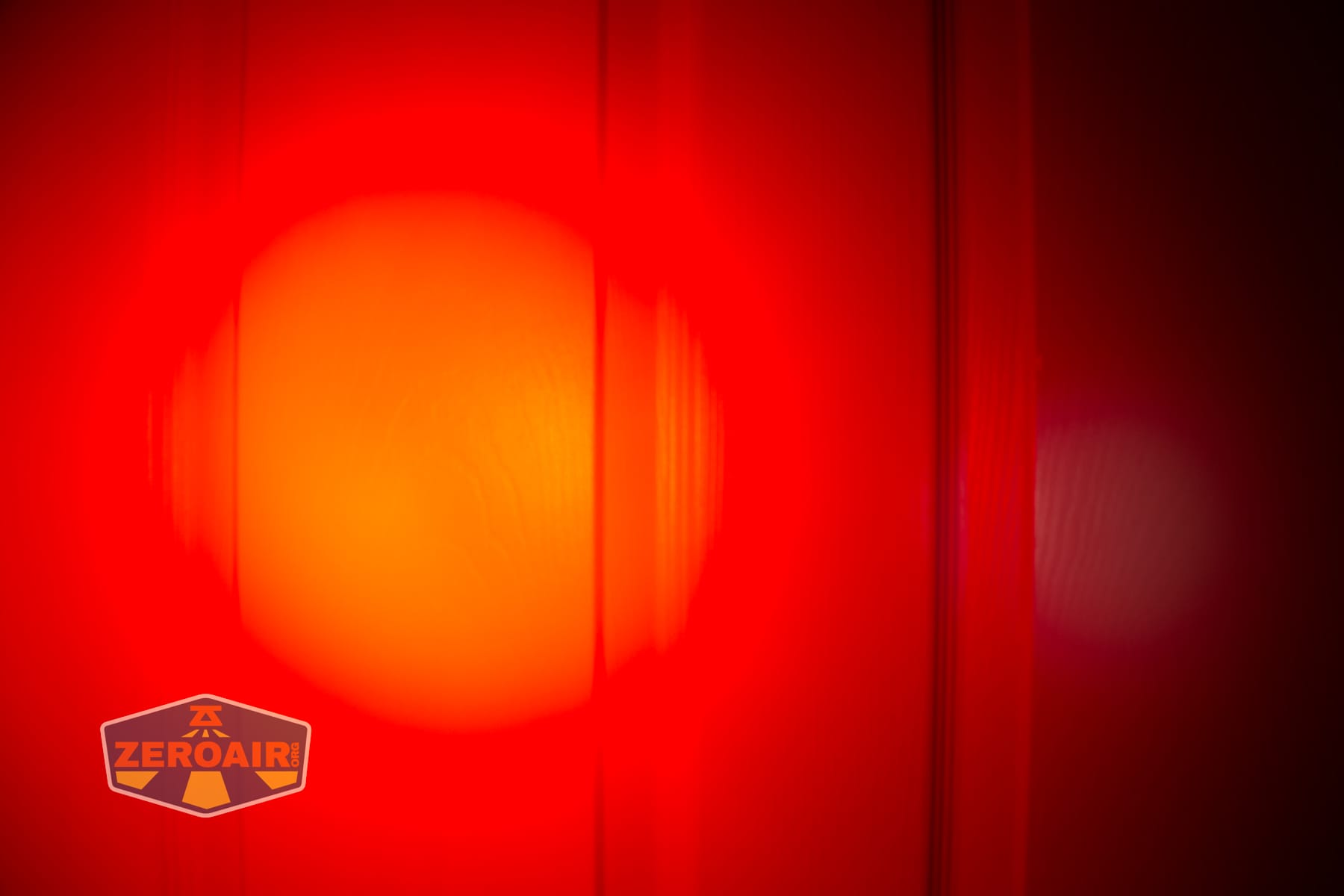 Trustfire Mini C Multifunctional clip-on flashlight beamshots on door (at 1') compared to nichia 219b 4500K