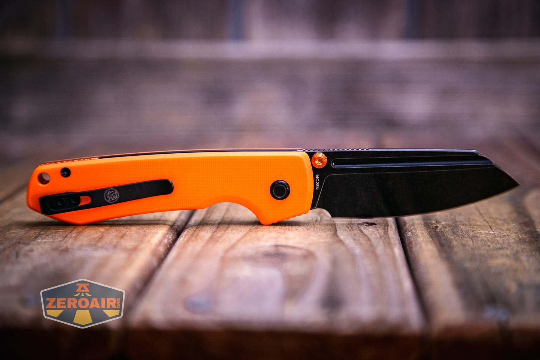 Vosteed Raccoon TLL Orange G10 knife open clip-side