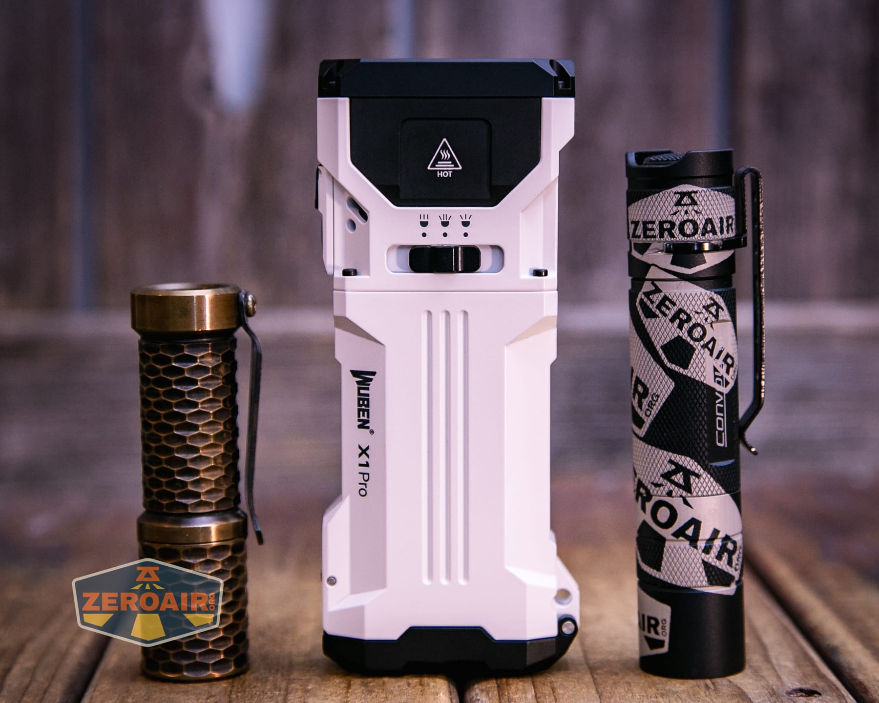 Wuben X1 Pro 2 flashlight with two standard sized flashlights