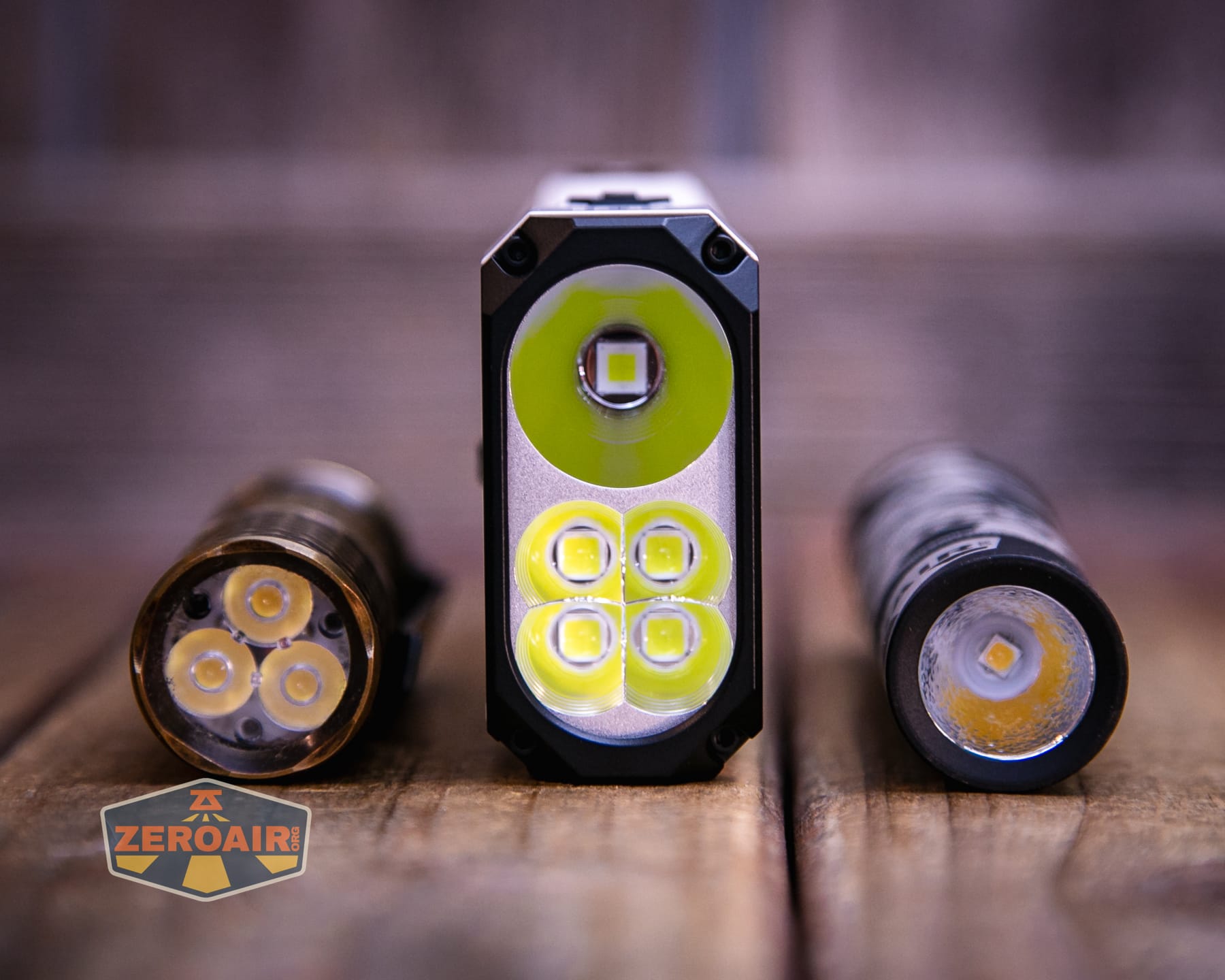 Wuben X1 Pro 2 flashlight with two standard sized flashlights