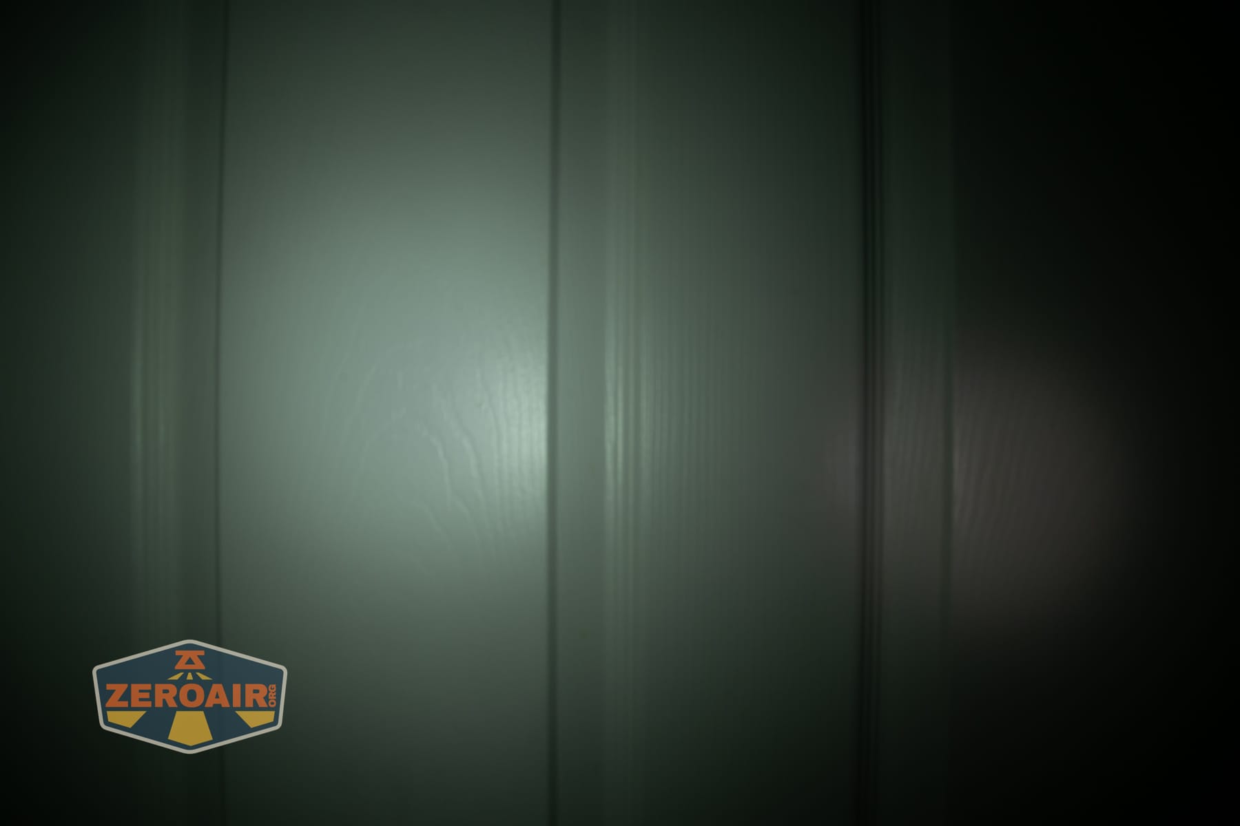 Wuben X1 Pro 2 flashlight beamshots on door (at 1') compared to nichia 219b 4500K