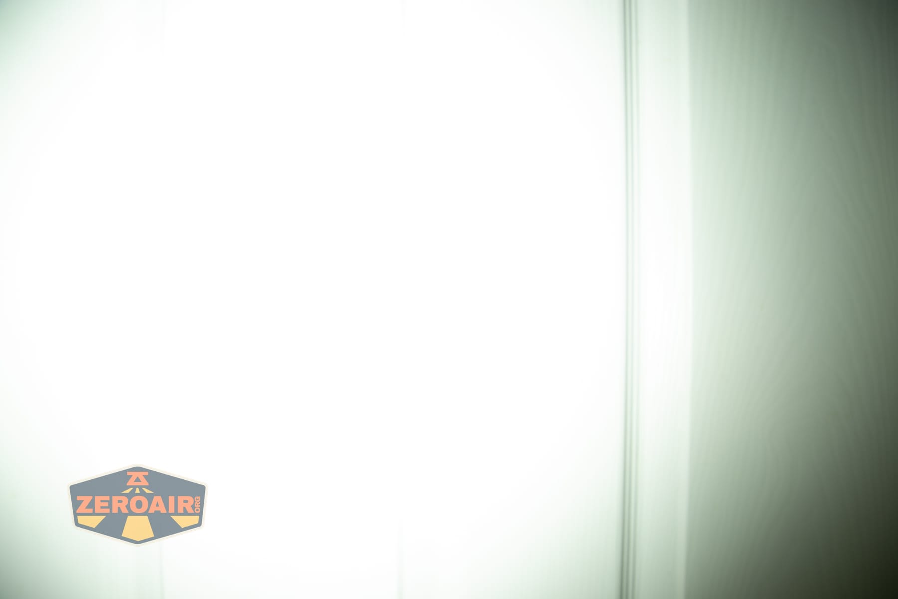 Wuben X1 Pro 2 flashlight beamshots on door (at 1') compared to nichia 219b 4500K