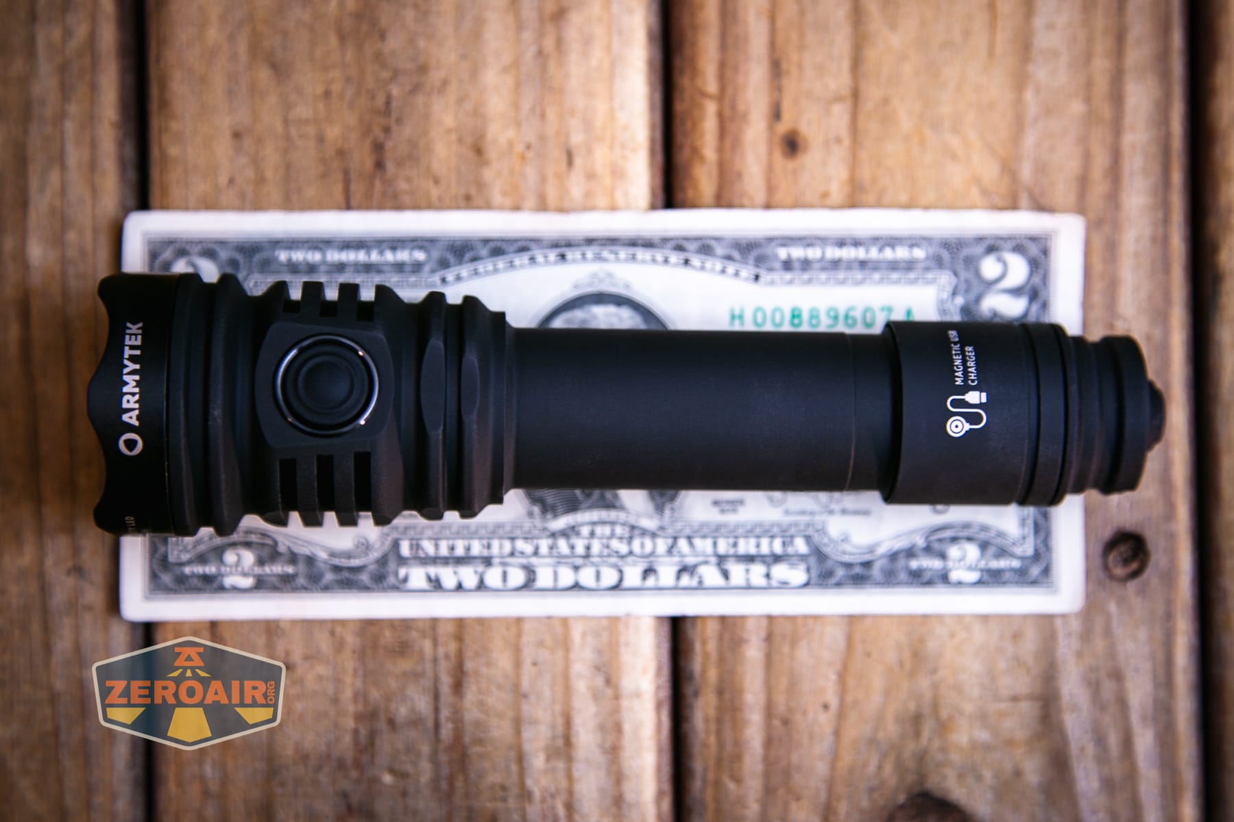 Armytek Predator Pro Max 2026 on a two dollar bill