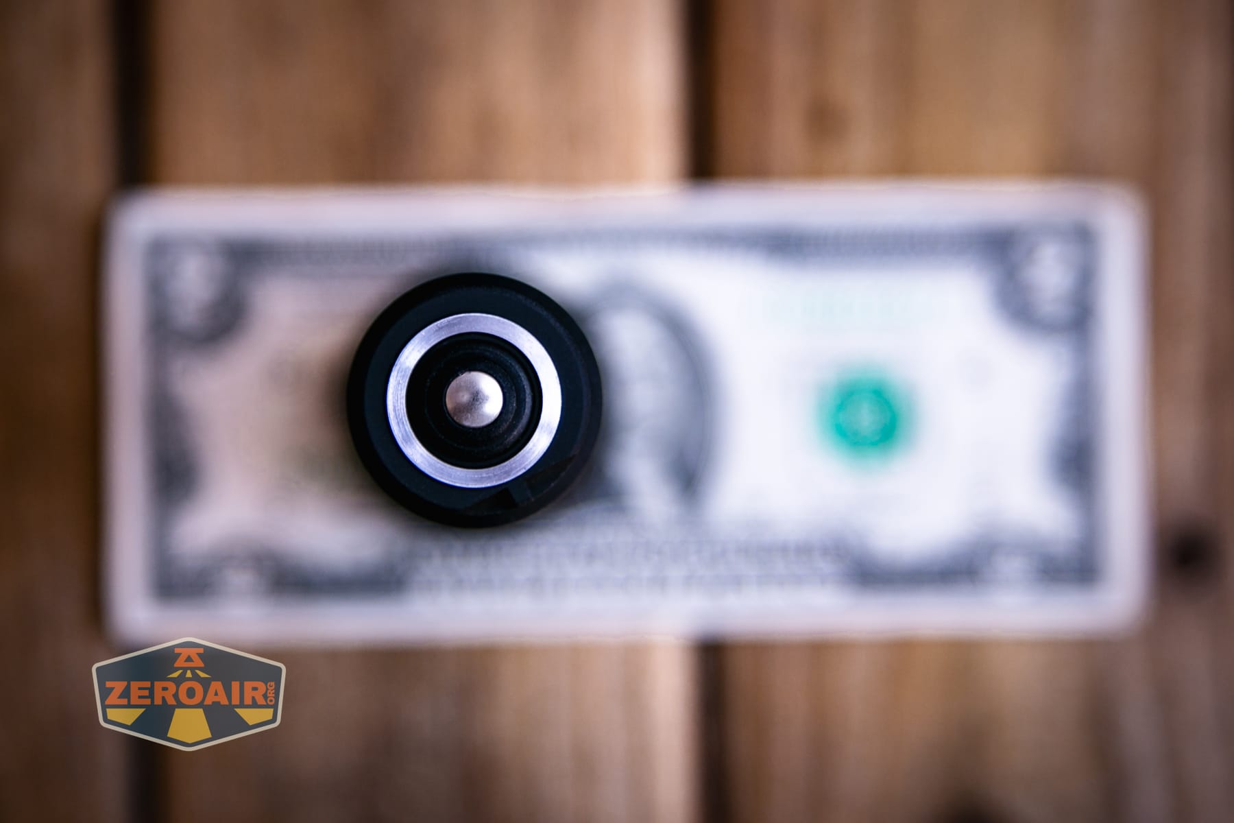 Armytek Predator Pro Max 2026 on a two dollar bill