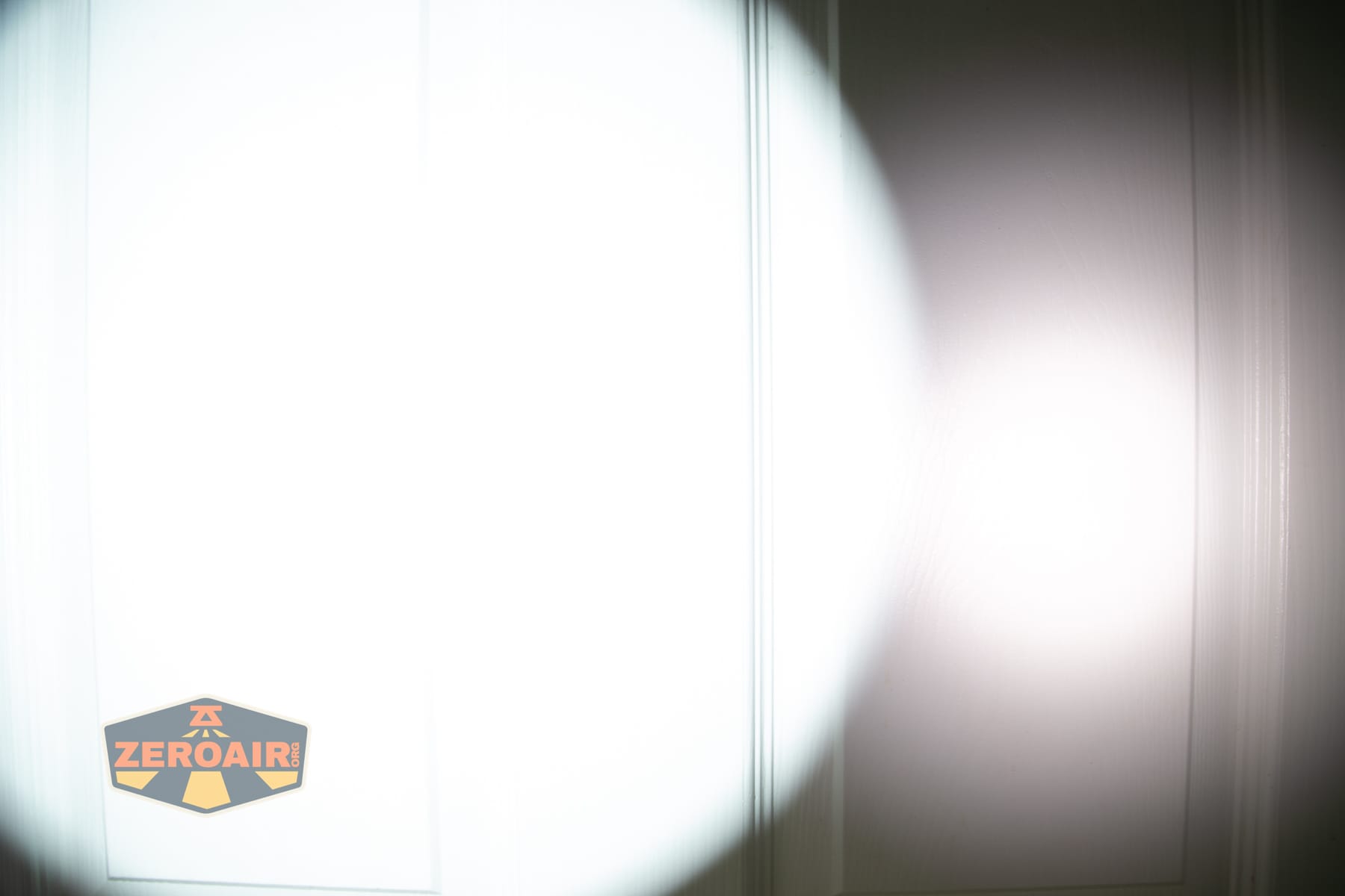 Armytek Predator Pro Max 2026 beamshots on door (at 1') compared to nichia 219b 4500K