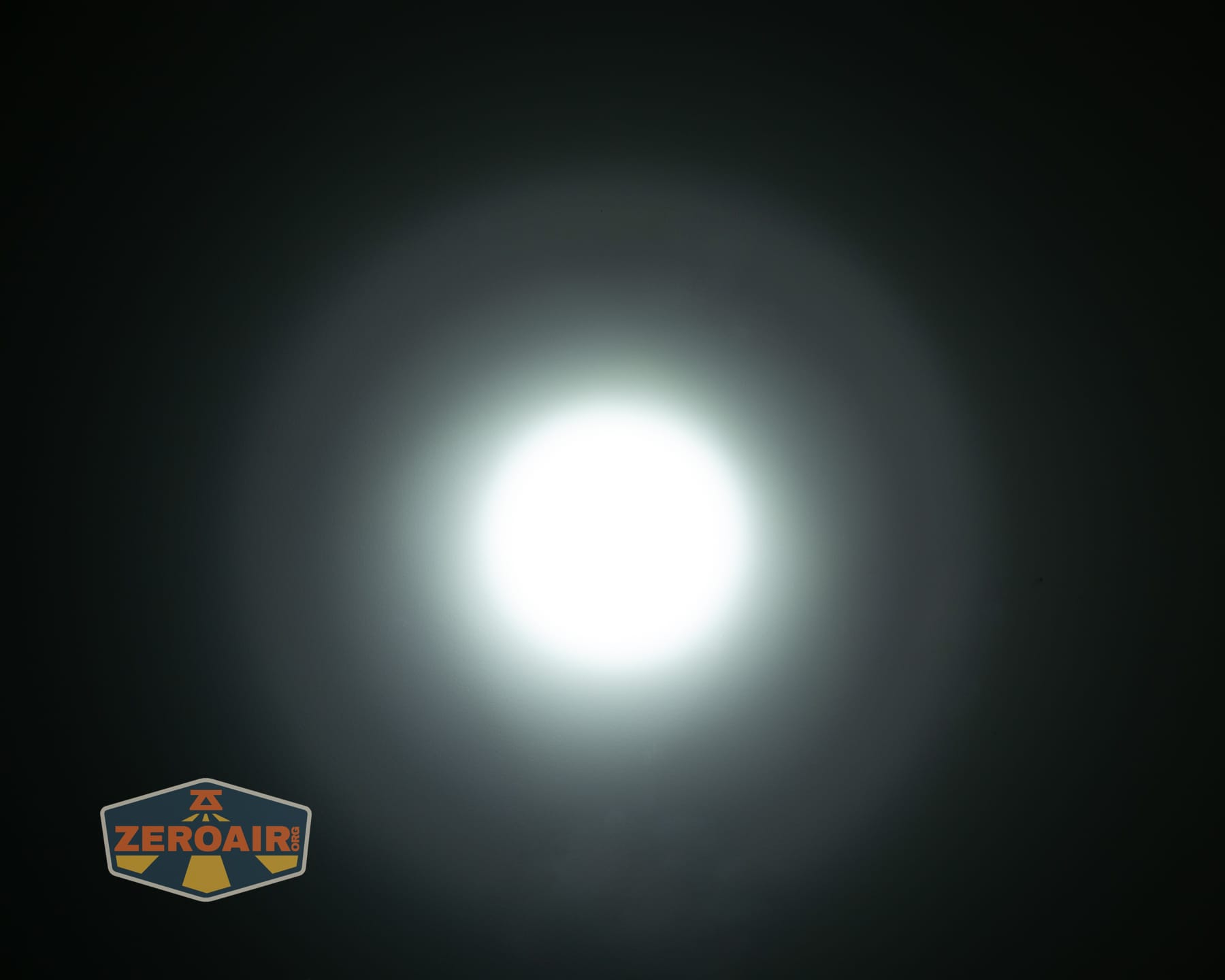 Nextorch eStar headlamp beamshots on ceiling