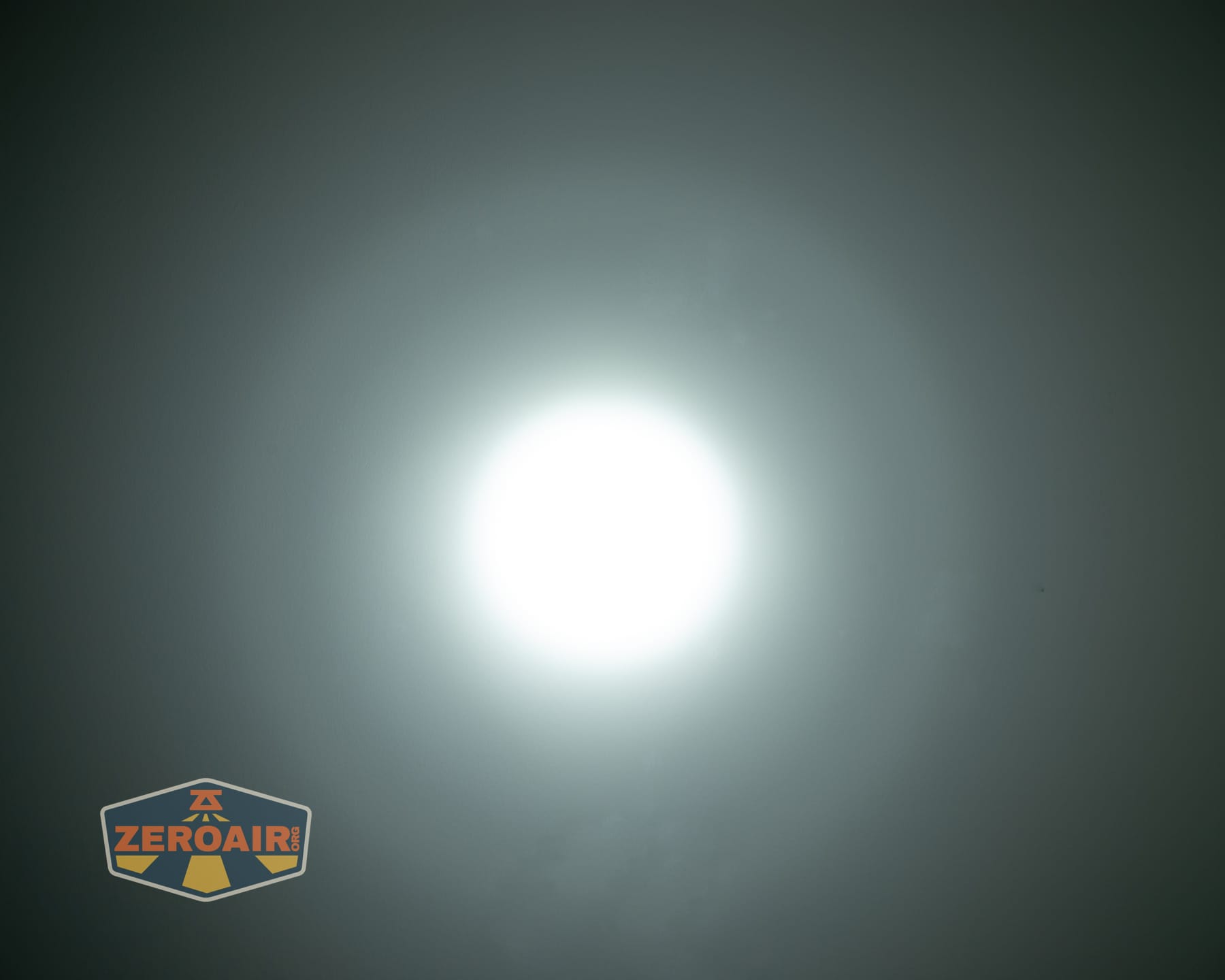 Nextorch eStar headlamp beamshots on ceiling