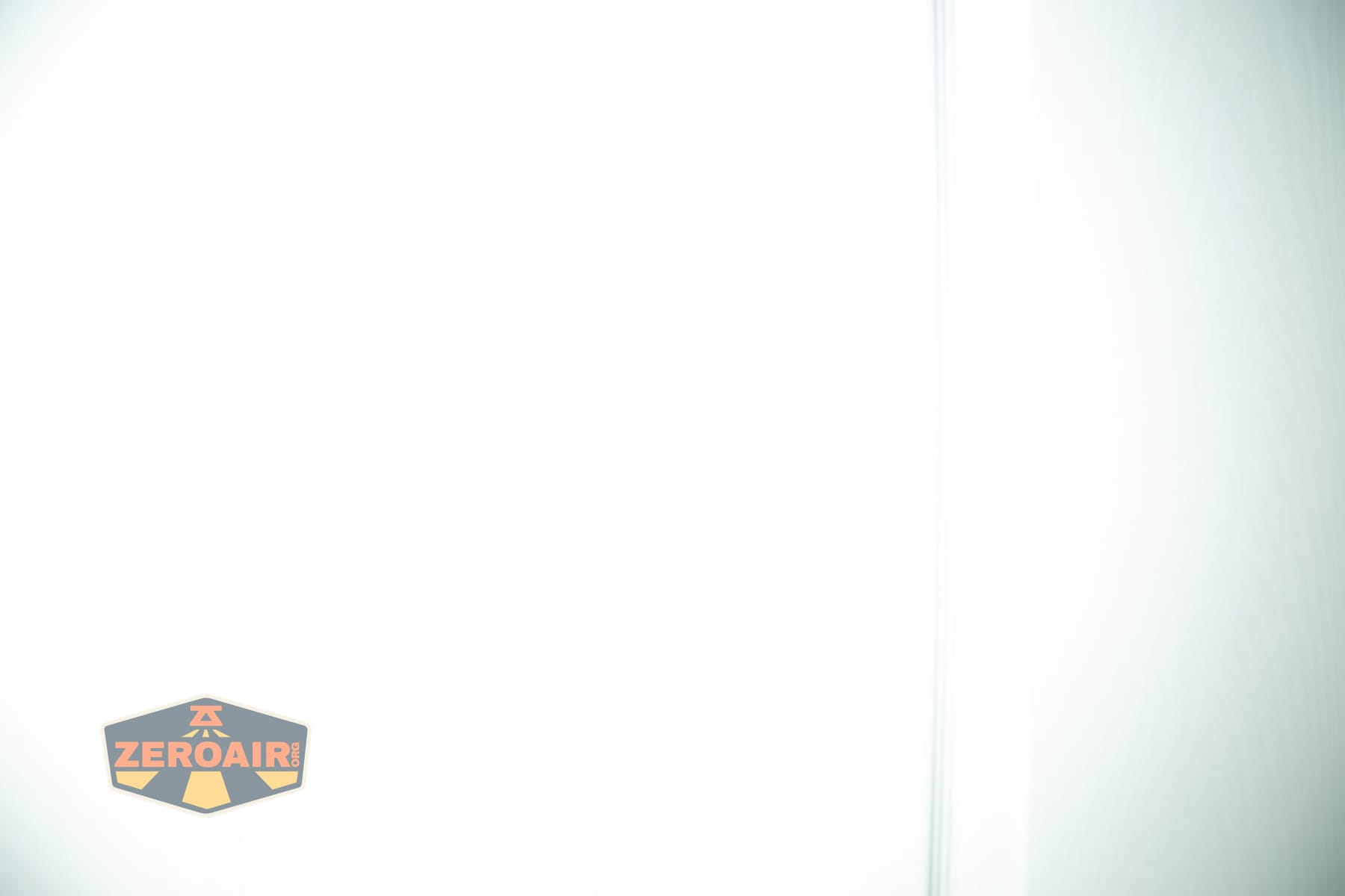 Nextorch eStar headlamp beamshots on door (at 1') compared to nichia 219b 4500K