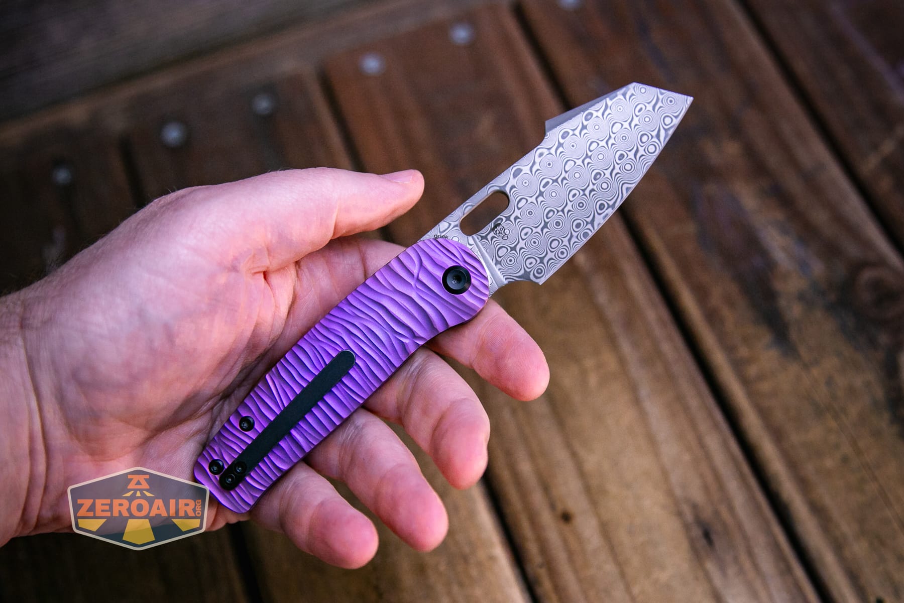 Kansept Orlok knife open in hand