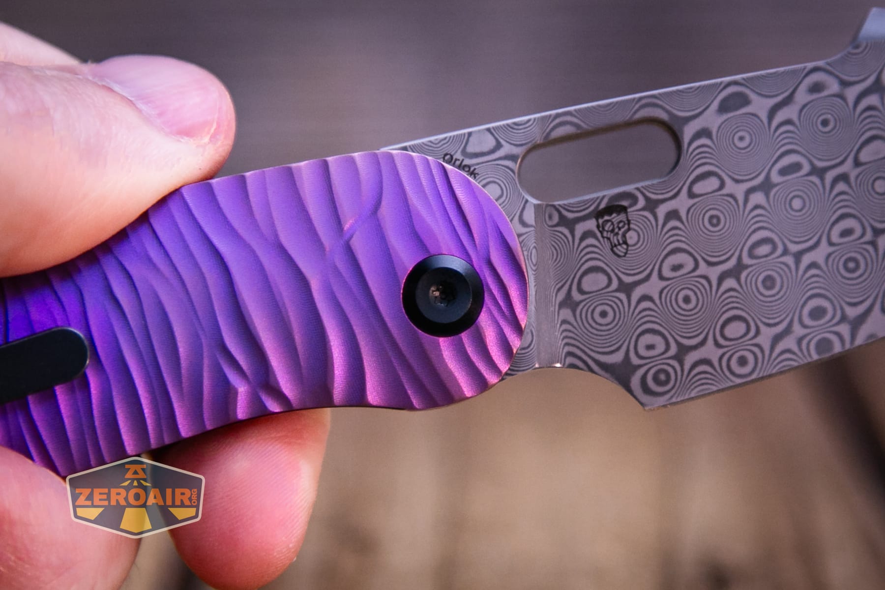 Kansept Orlok knife thumb hole view