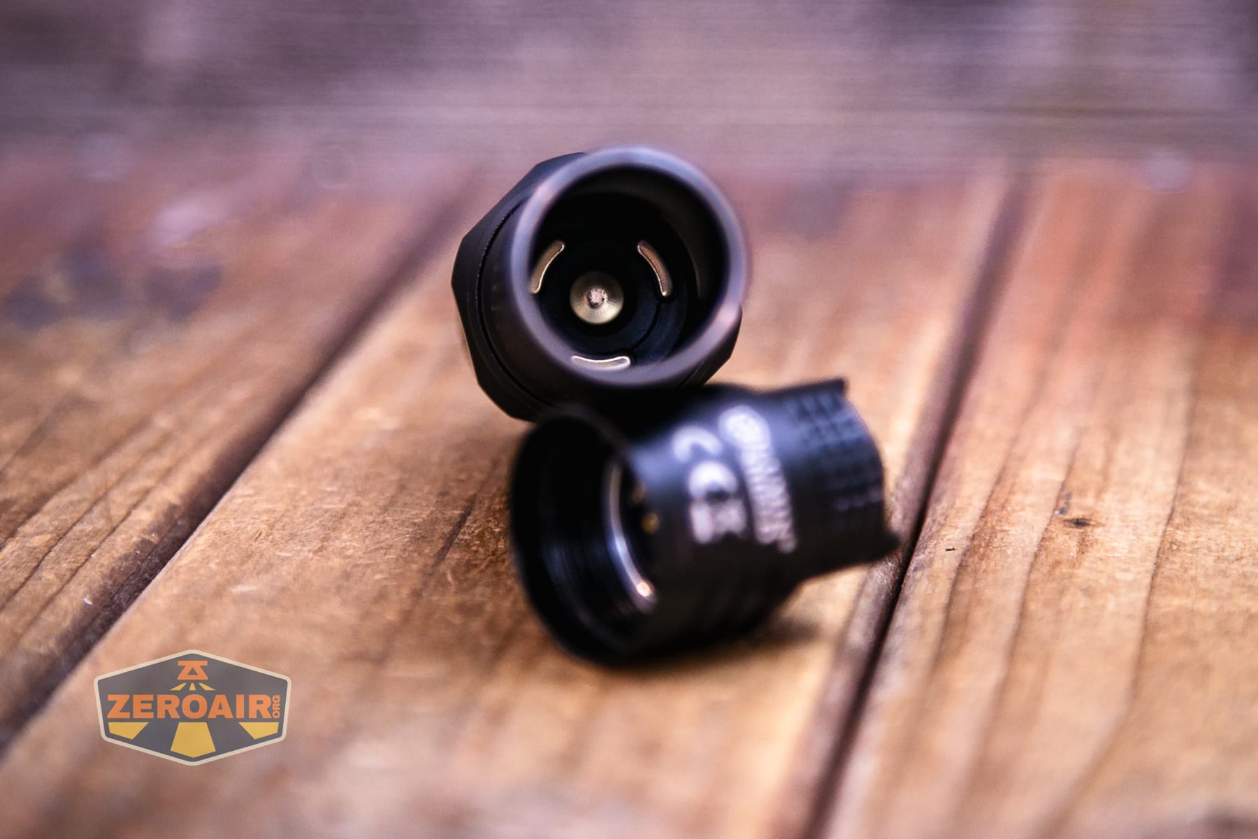 Nitecore P27iX customizable tactical flashlight showing head contacts
