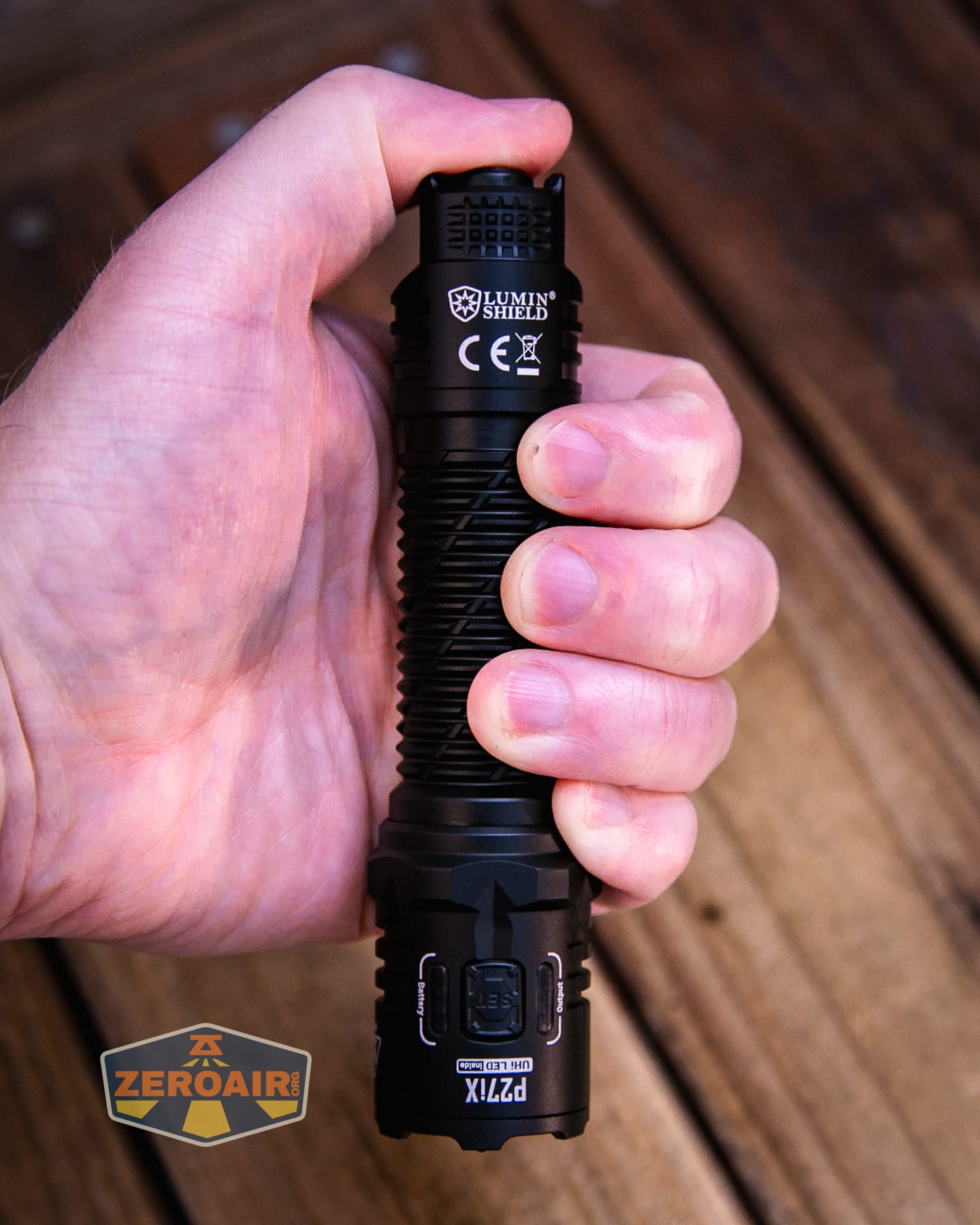 Nitecore P27iX customizable tactical flashlight in hand