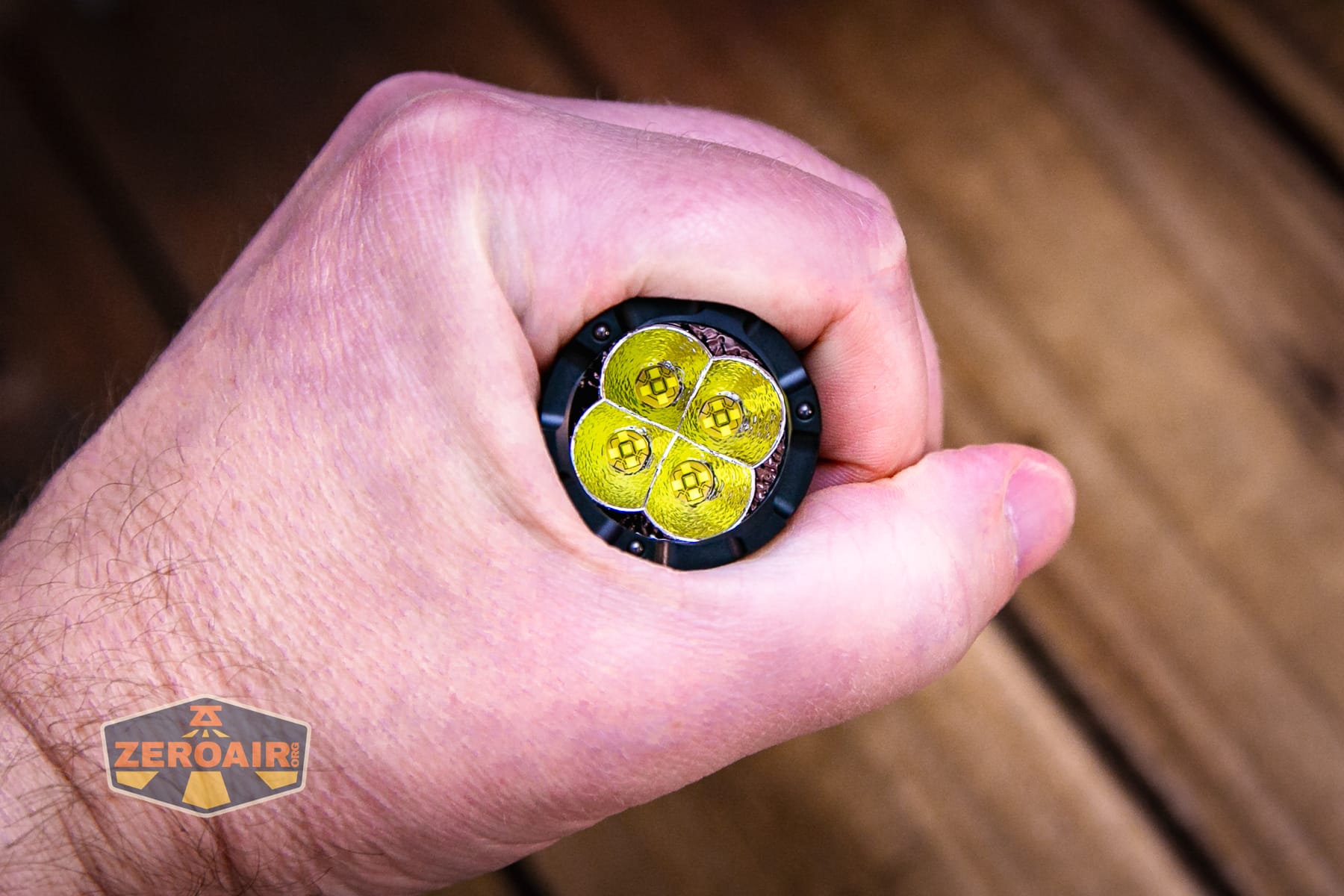 Nitecore P27iX customizable tactical flashlight in hand