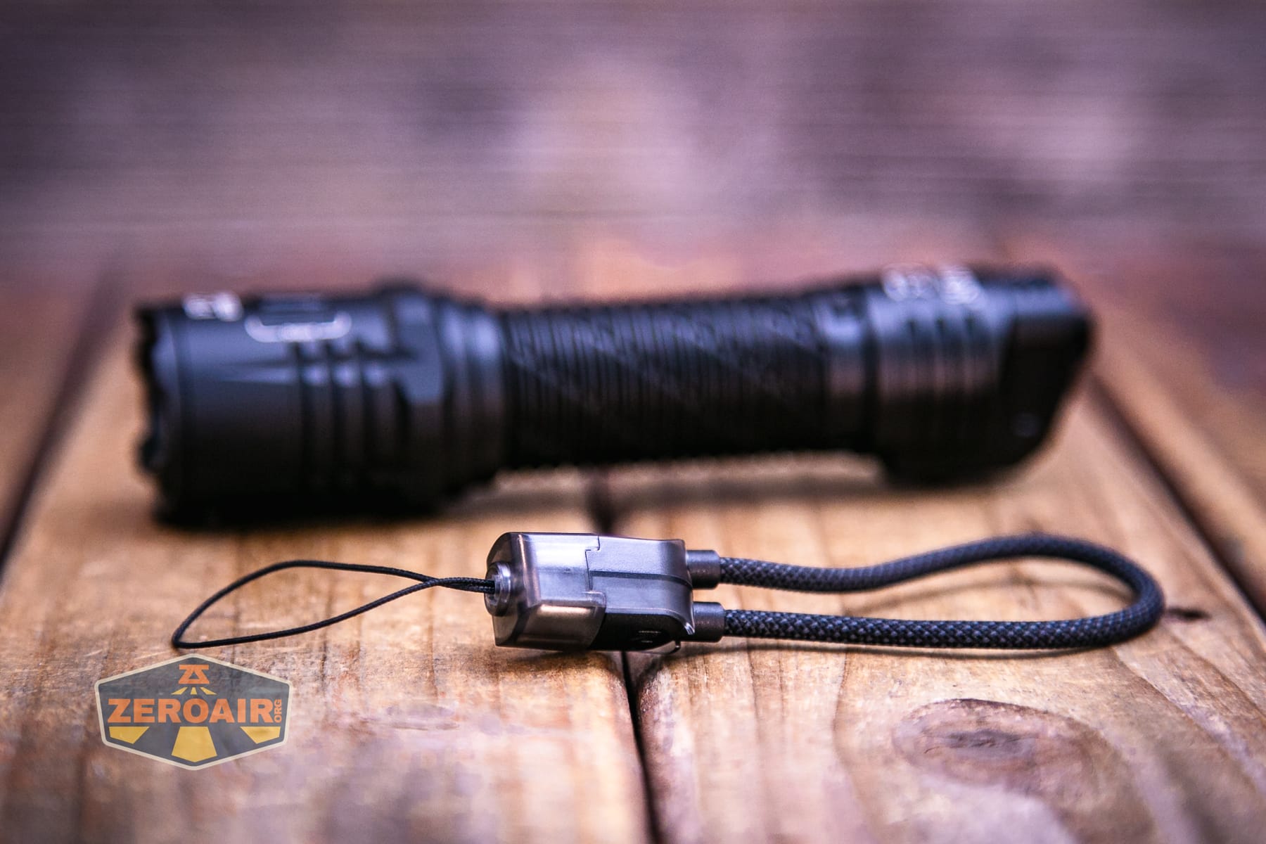 Nitecore P27iX customizable tactical flashlight with lanyard