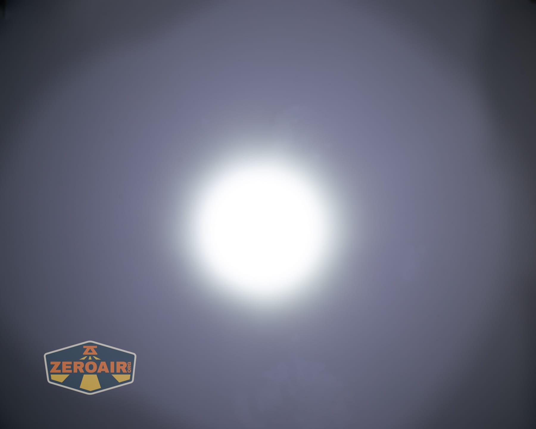 Nitecore P27iX customizable tactical flashlight beamshots on ceiling