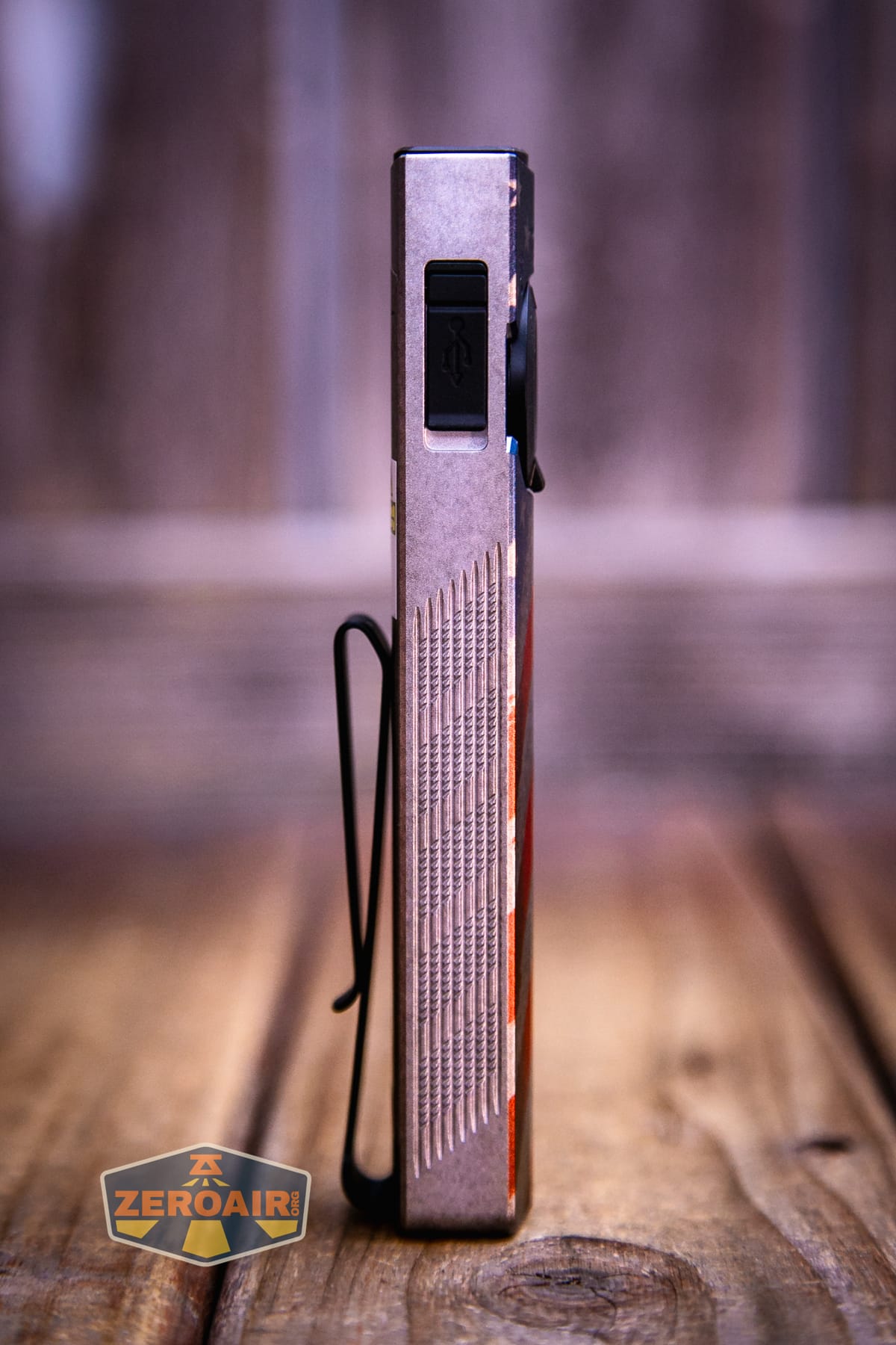 Olight Arkpro Stars and Stripes flat flashlight showing all sides