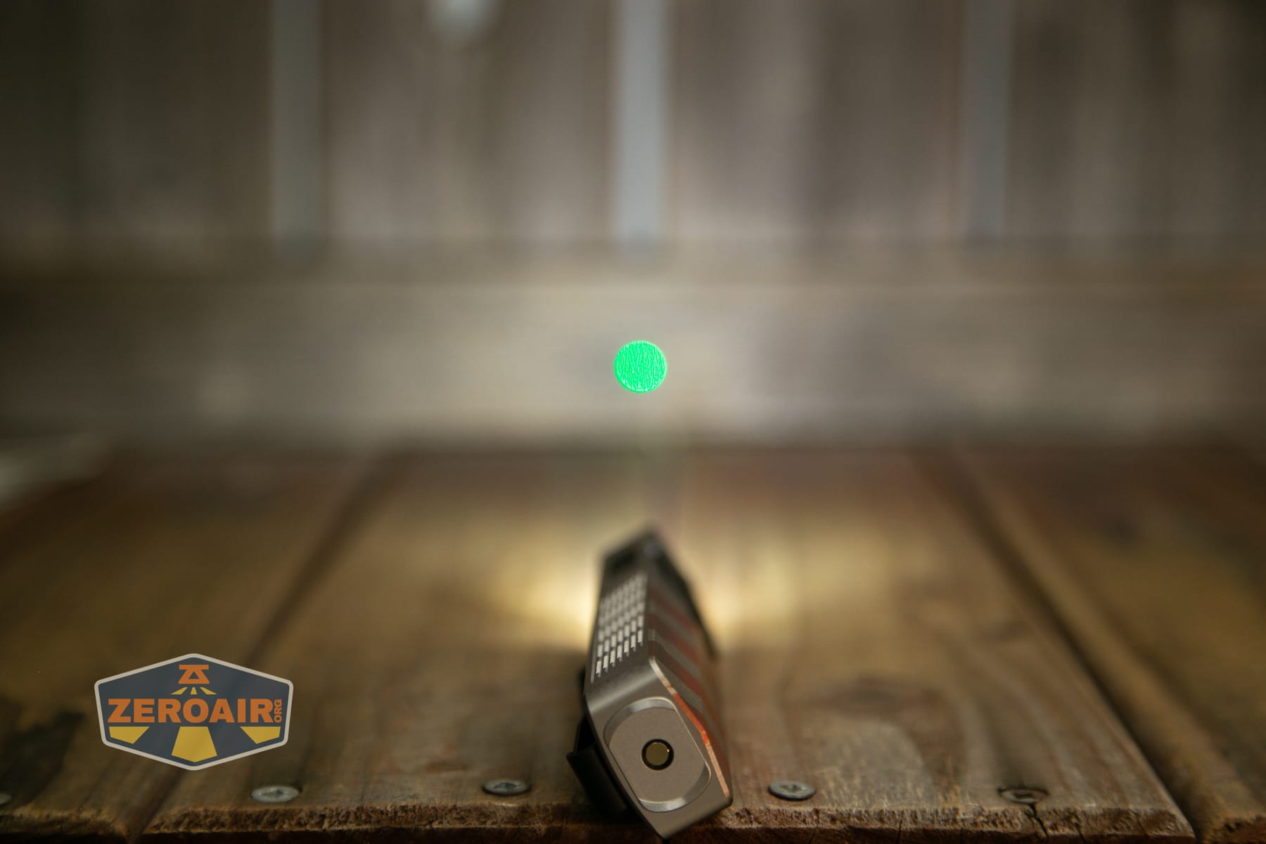 Olight Arkpro Stars and Stripes flat flashlight laser on